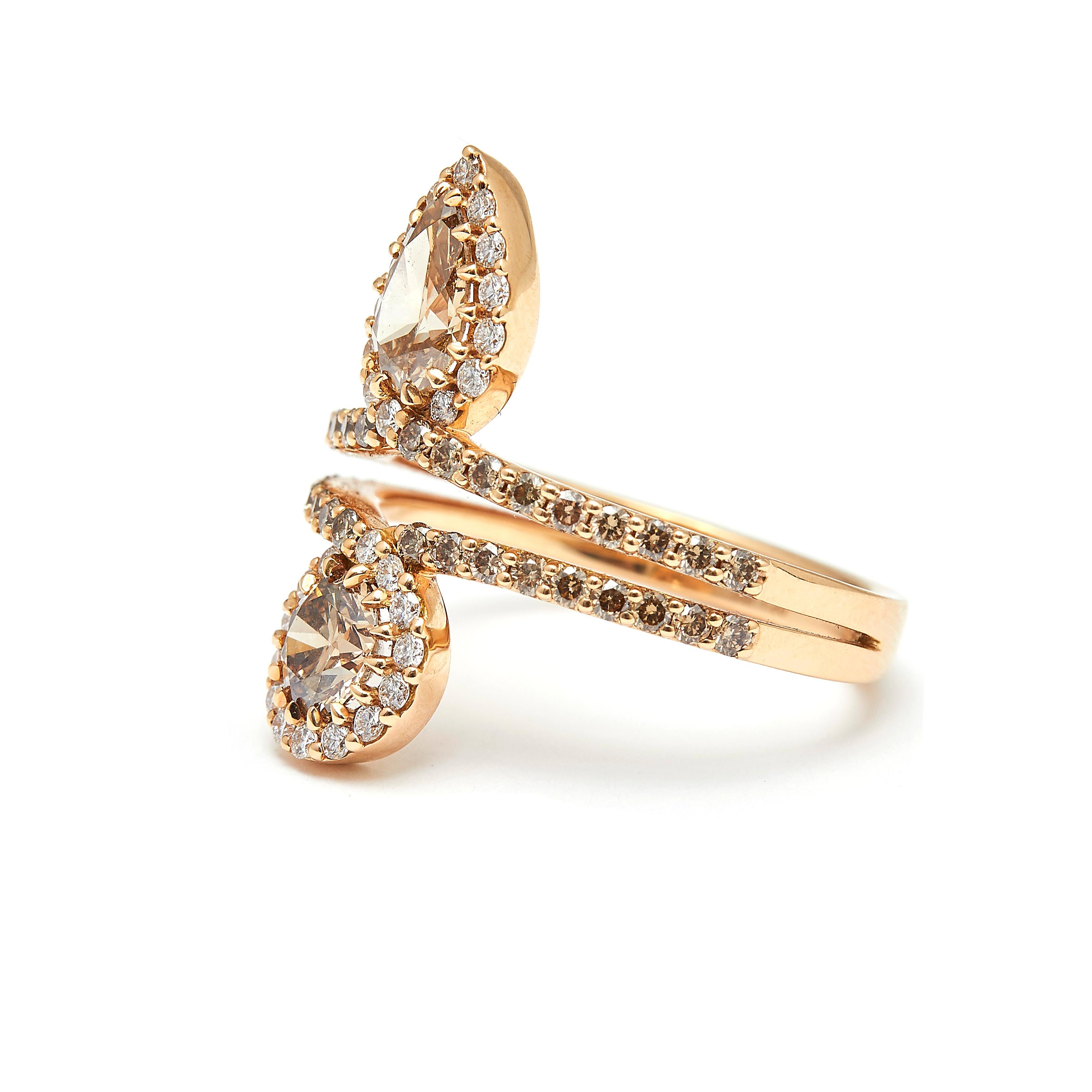This really modern ring is edgy and fun and features warm tones of rose gold and brown diamonds. Its a really cool piece that is unique and sure to constantly garner compliments. Total brown diamonds 1.56ct and total white diamonds 0.26ct.