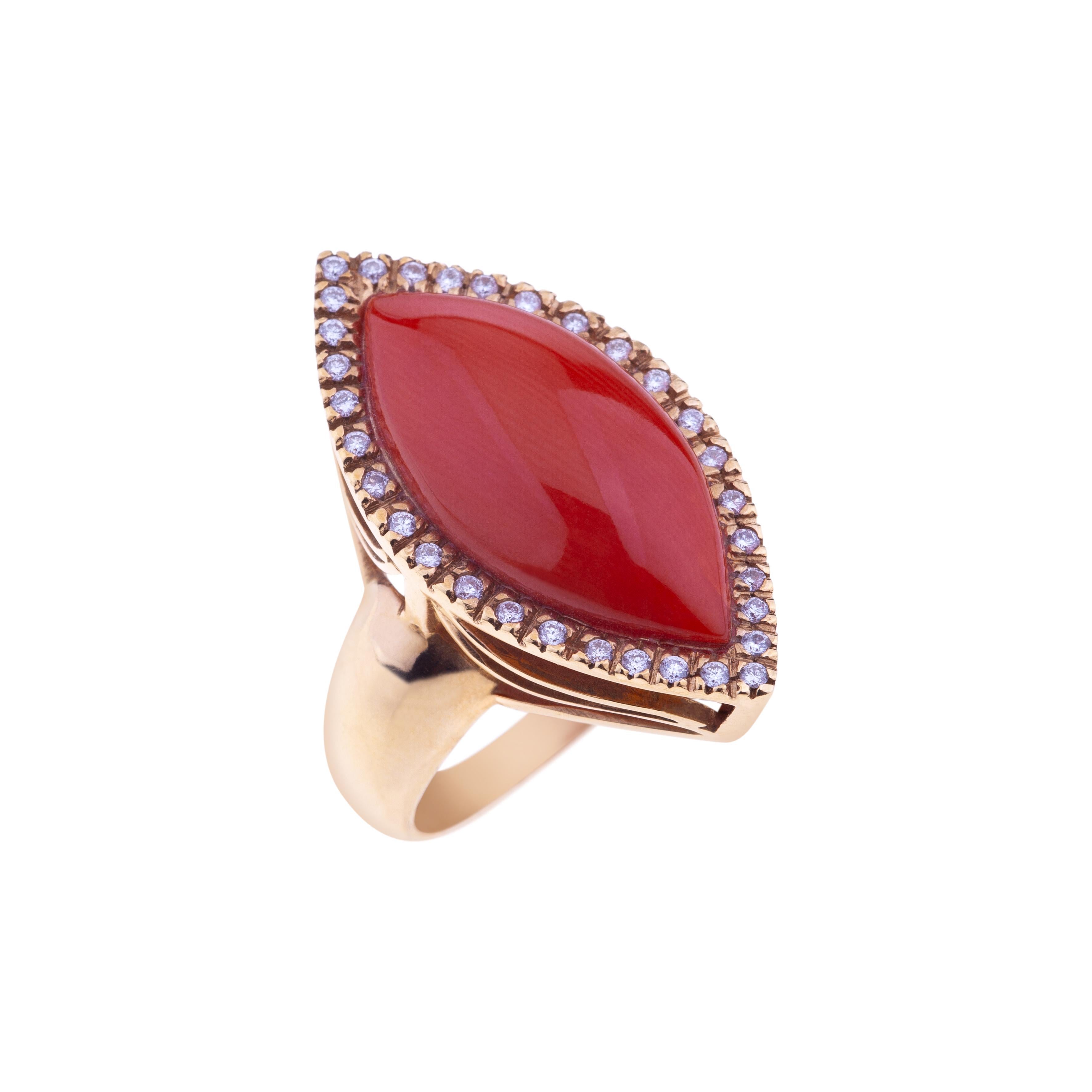 Rose Gold Ring with Marquise Mediterranean Coral and Diamond Profile.
A Classic Design for this Ring with a Exceptional Red Mediteranean Coral set on Pink Gold and Diamond Profile (ct.0.40).
Wholly Manufactured in Italy by expert hands of
