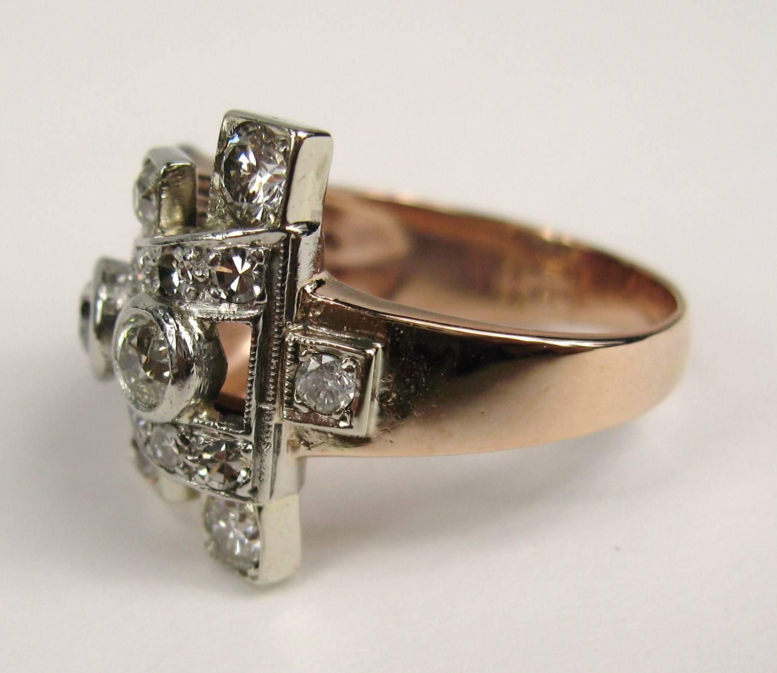 Stunning 1940s Ring. 15 diamonds total 1.5 carts, as well as 10 prong set graduated in size rubies. 13 prong set diamonds as well. Ring is a size 7 but can be sized up or down by us or your jeweler. This is a stunning example of 1940s jewelry.
