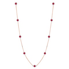 Rose Gold Nine Ruby Bezel Set Pendant Necklace Weighing Two Carat