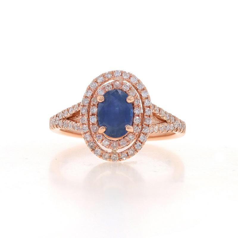 Size: 7
Sizing Fee: Up 2 sizes for $40

Metal Content: 14k Rose Gold

Stone Information
Natural Sapphire
Treatment: Heating
Carat(s): 1.02ct
Cut: Oval
Color: Blue

Natural Diamonds
Carat(s): .40ctw
Cut: Single
Color: G - H
Clarity: SI2 - I1

Total