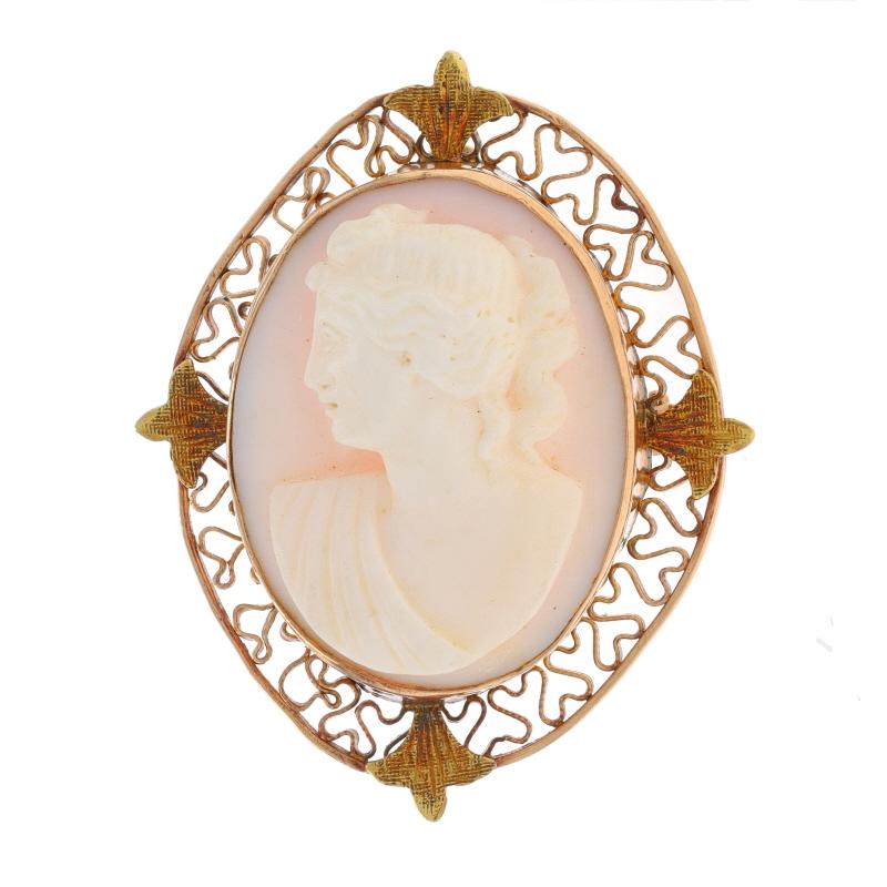 Era: Art Deco
Date: 1920s - 1930s

Metal Content: 10k Rose Gold & 10k Yellow Gold

Stone Information
Natural Shell
Cut: Carved Cameo
Size: 22.9mm x 17.7mm

Style: Convertible Brooch/Pendant
Fastening Type: Hinged Pin and Locking C-Clasp
Theme: