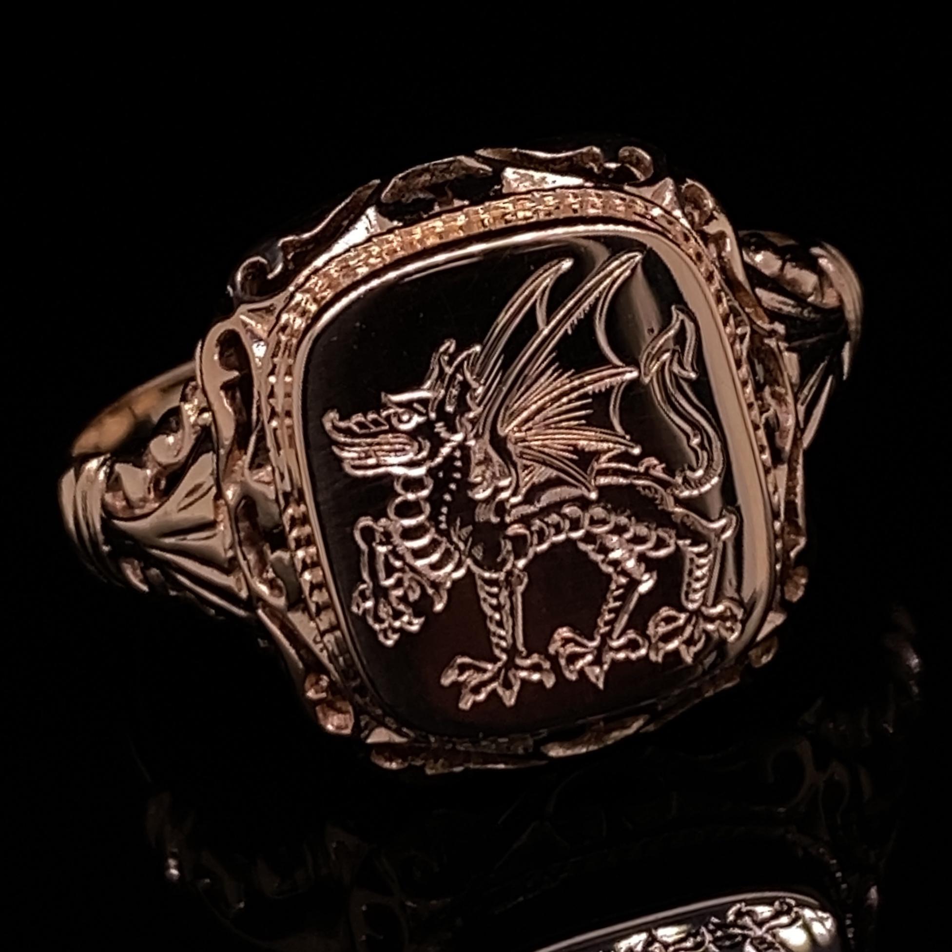 This is a 14 karat rose gold Hungarian signet ring that came to us 