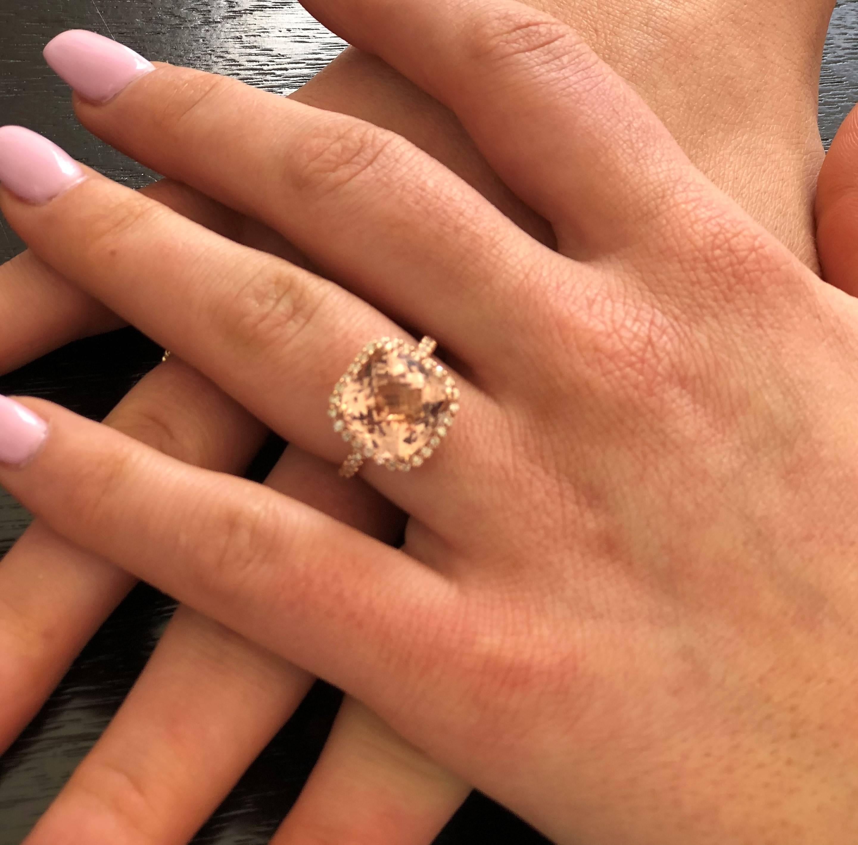 18k karat rose gold cocktail ring 
Featuring six carat cushion shape morganite 
Surrounded by  pave set diamonds weighing 0.64 carat
Ring finger size 6 In Stock
New Ring
Ring can be resized
Handmade in the USA
Our team of graduate gemologists