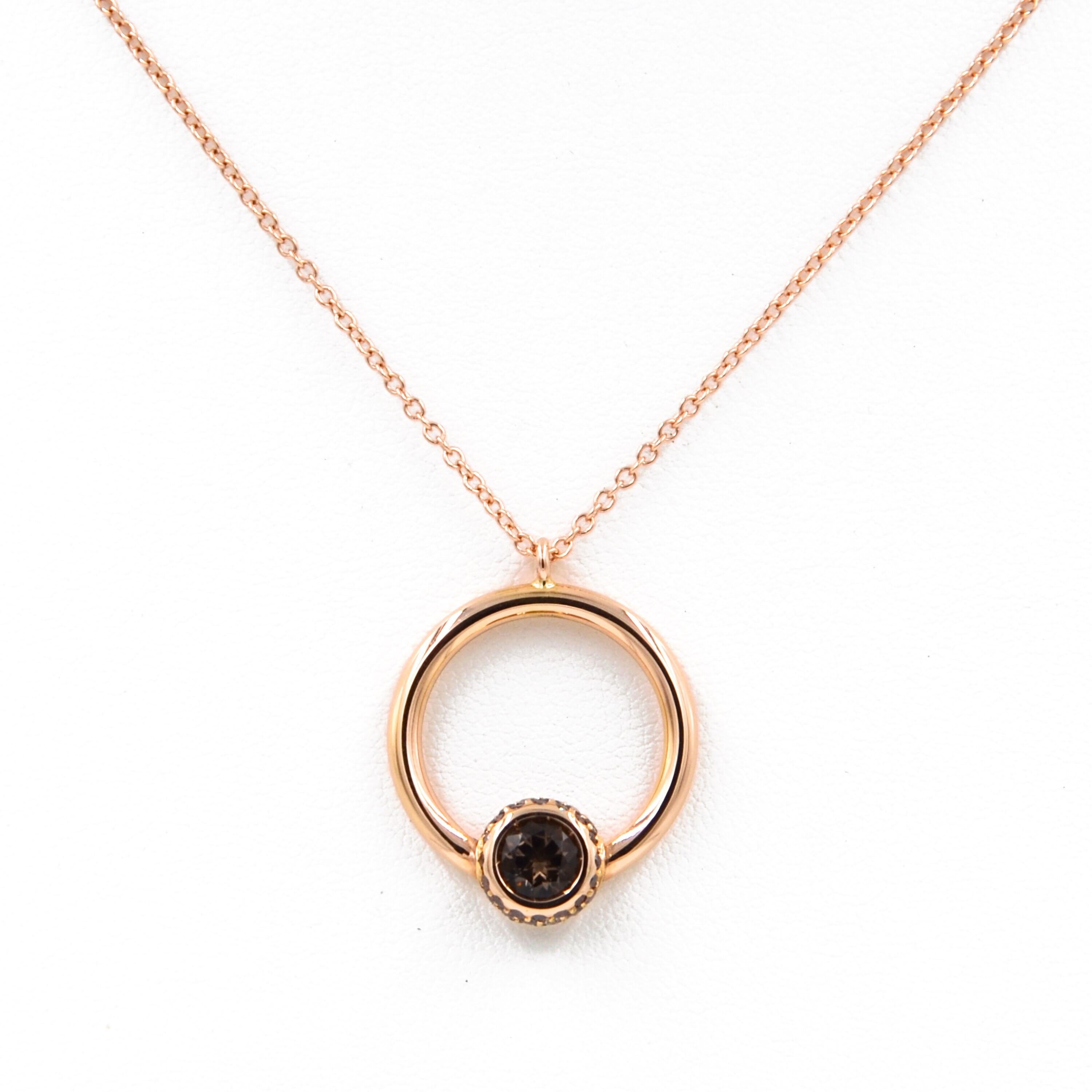 Rose gold Smokey Quartz and Brown Diamonds Pave' GARAVELLI Pendant with Chain 
Chain Length cm 50 with. a loop at cm45 
Circle diameter mm 20
18kt ROSE GOLD gr : 6,05
BROWN DIAMONDS ct : 0,43
SMOKEY QUARTZ stone diameter mm 6  ct : 0,67