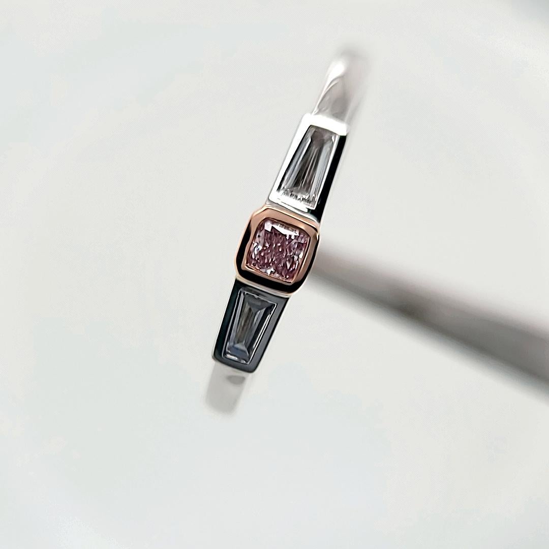 Contemporary 14k Gold Stackable Ring Featuring a 0.08 Pink Diamond Accented by Baguettes For Sale