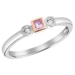 14k Gold Stackable Ring featuring a 0.10 Pink Diamond Accented by White Diamond