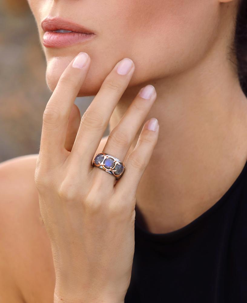 The Jupiter ring’s vintage appeal is enriched by its labradorite and rose gold setting. The band’s striking inlaid logo offers its own timeless feel. 
One of the most amazing features of this ring is how comfortable and streamline it is.

14kt rose