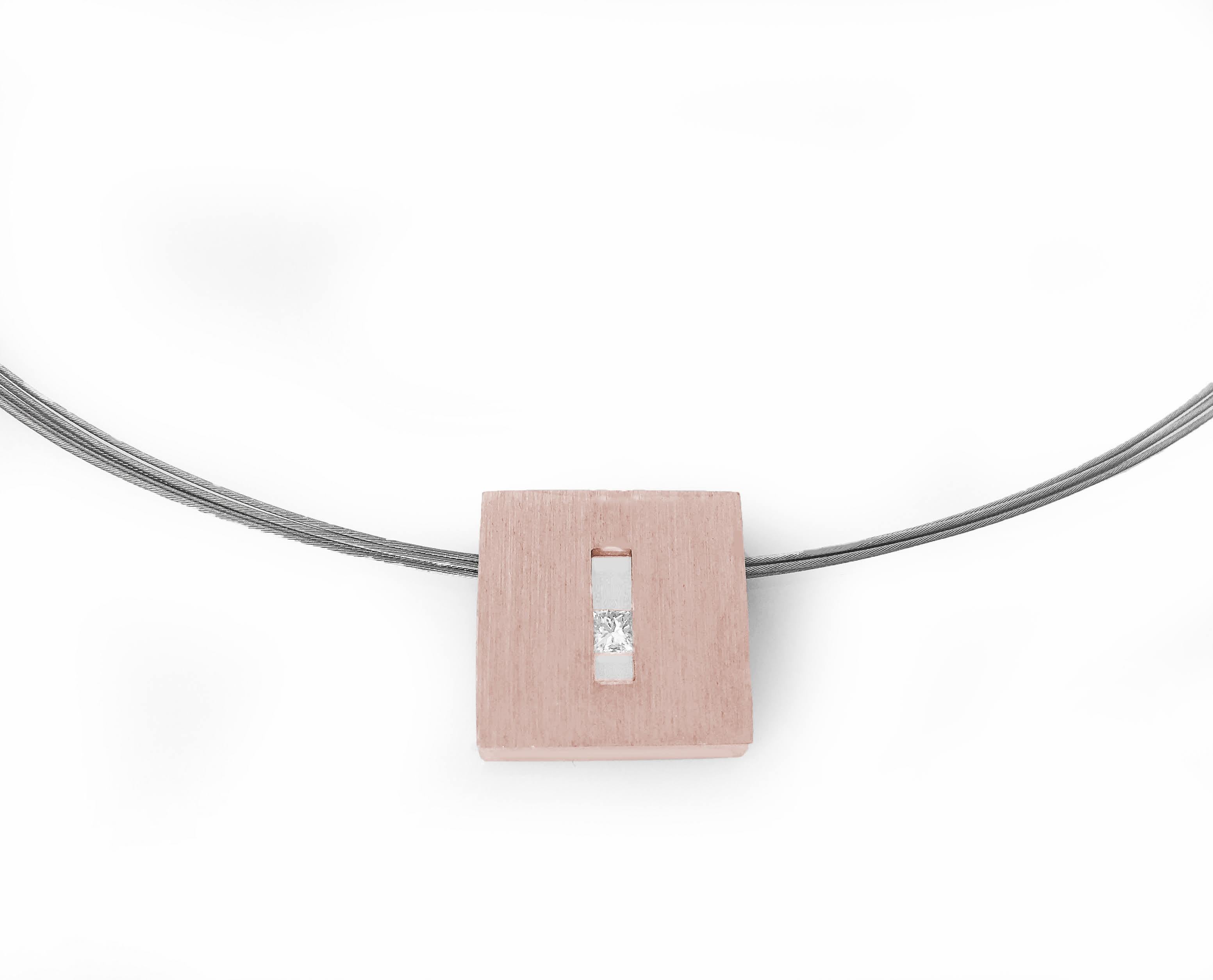 This Princess Diamond in Rose Gold Suspended Square Pendant with Princess Diamond is part of our Suspension Collection. Modern and architecturally inspired, this square pendant is shown in rose gold with a brushed finish and set off center with an