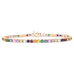 Bracelet tennis en or rose avec pierres précieuses multicolores