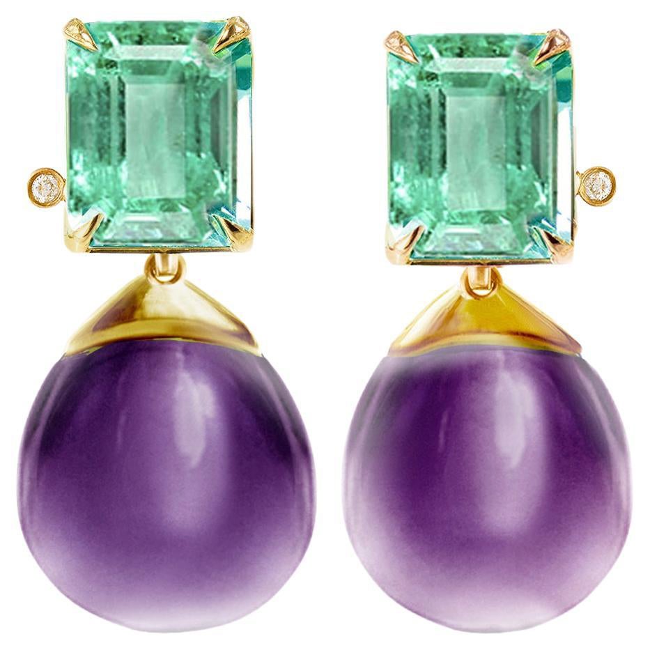 Clous d'oreilles pendantes en or rose avec émeraudes vertes et diamants