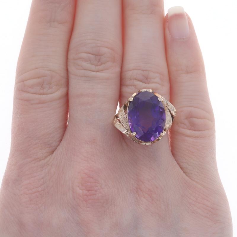 Size: 9 1/2
Sizing Fee: Up 2 sizes for $35 or Down 2 sizes for $35

Era: Vintage

Metal Content: 14k Rose Gold

Stone Information

Natural Amethyst
Carat(s): 9.00ct
Cut: Oval
Color: Purple

Total Carats: 9.00ct

Style: Cocktail Solitaire
