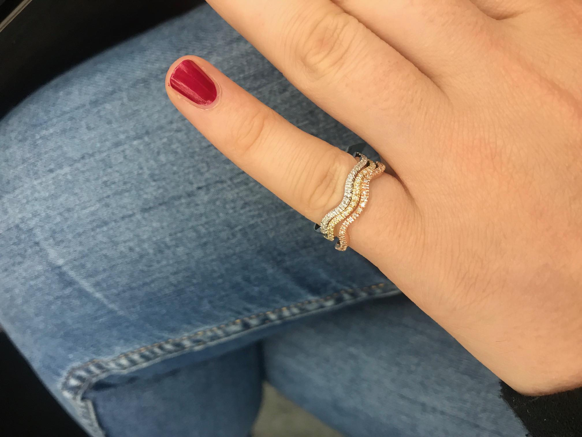 14K Rose gold wave ring featuring round brilliants weighing 0.07 carats. Available in white and yellow gold. 
Great for stacking!
Available in all sizes.