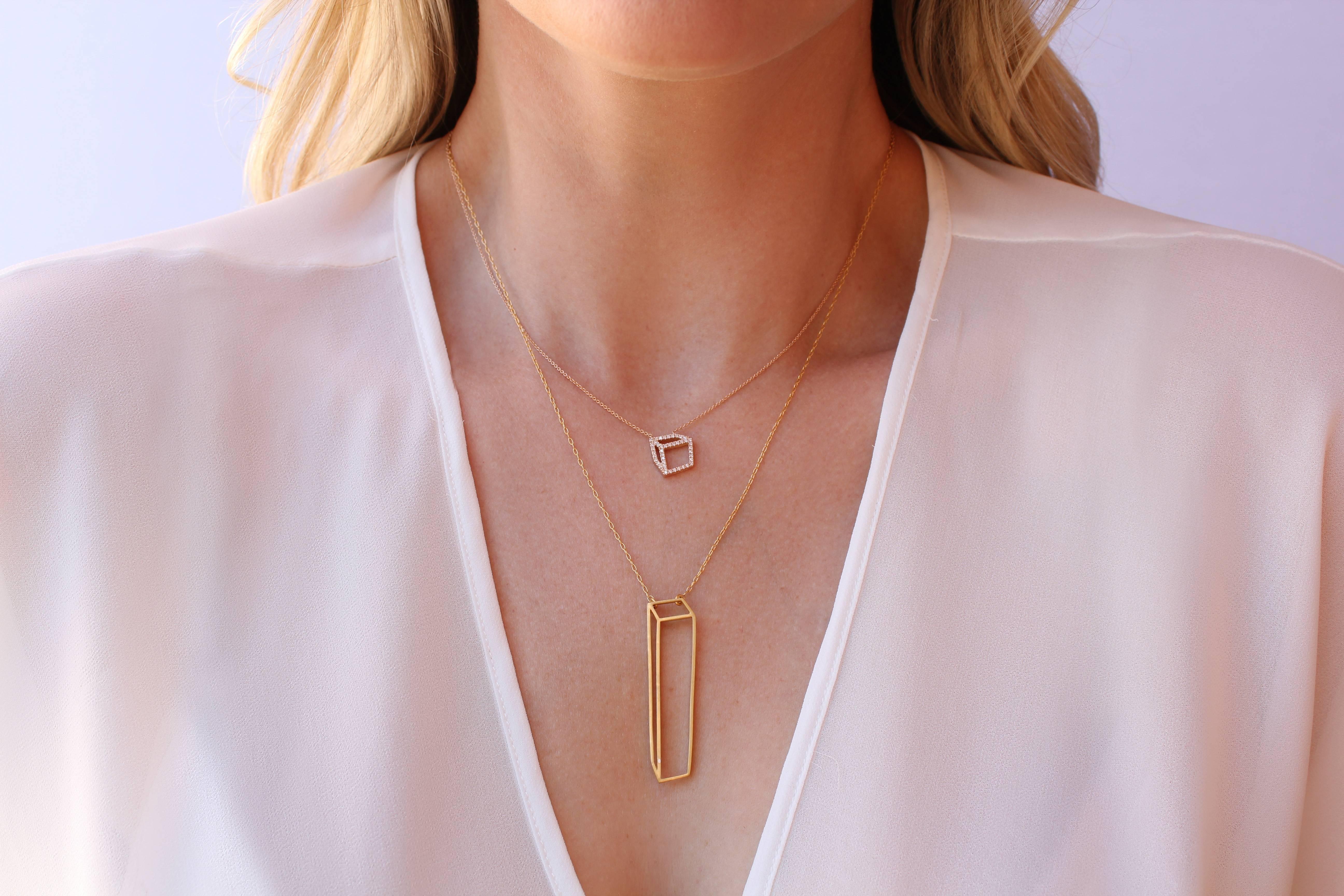 Small Cube Necklace handmade in London in high-polished 18k rose gold with 0.22 carats of round brilliant-cut white diamonds (F/G, vs1) on an 18k rose gold chain, 17 inches long. The pendant appears multi-dimensional but actually lays flat on the