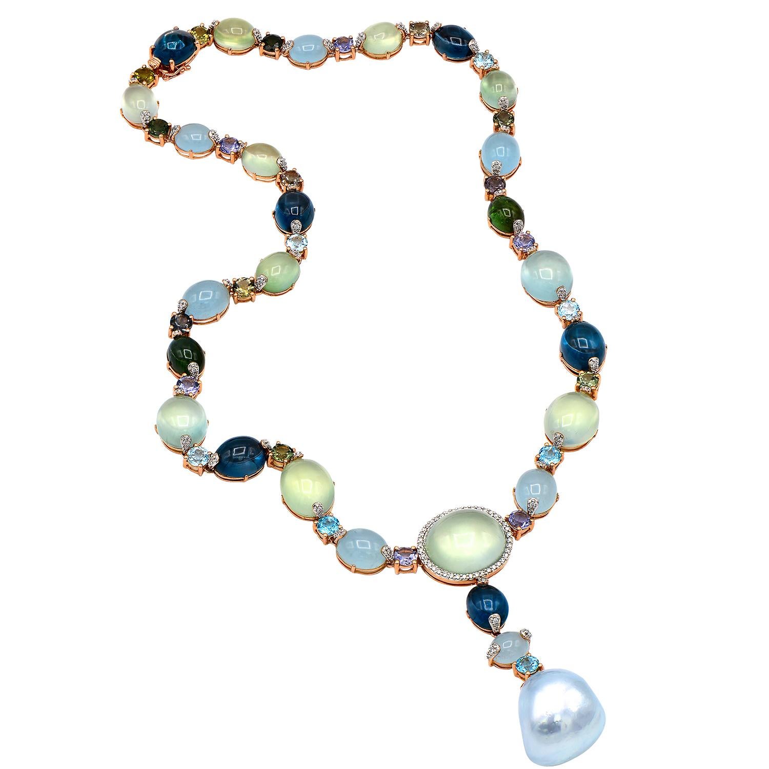 This unique and stunning necklace is guaranteed to be the finishing touch for any occasion. This necklace is made from 34 grams of 18 karat rose gold. Set along the entire necklace are various semiprecious gemstones including aquamarine, London blue
