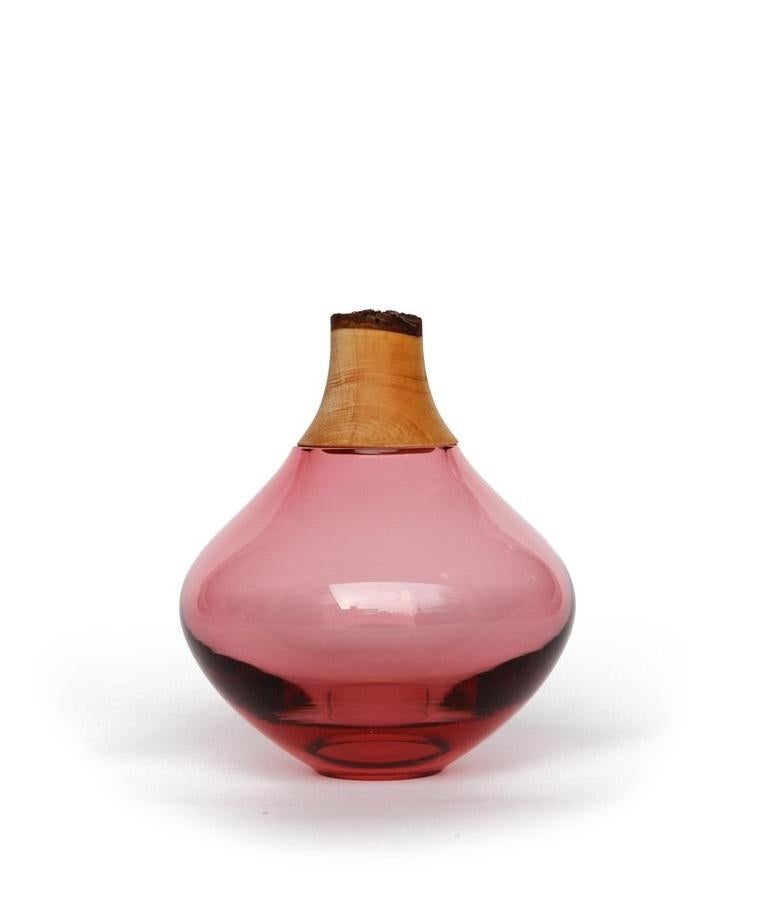 Rose Matisse stacking vessel II, Pia Wüstenberg
Dimensions: D 12 x H 16
Materials: glass, wood

The Matisse Stacking Vessels are treasures, small splashes of curvy glass with a wooden crown. The collection was originally designed for the Tate
