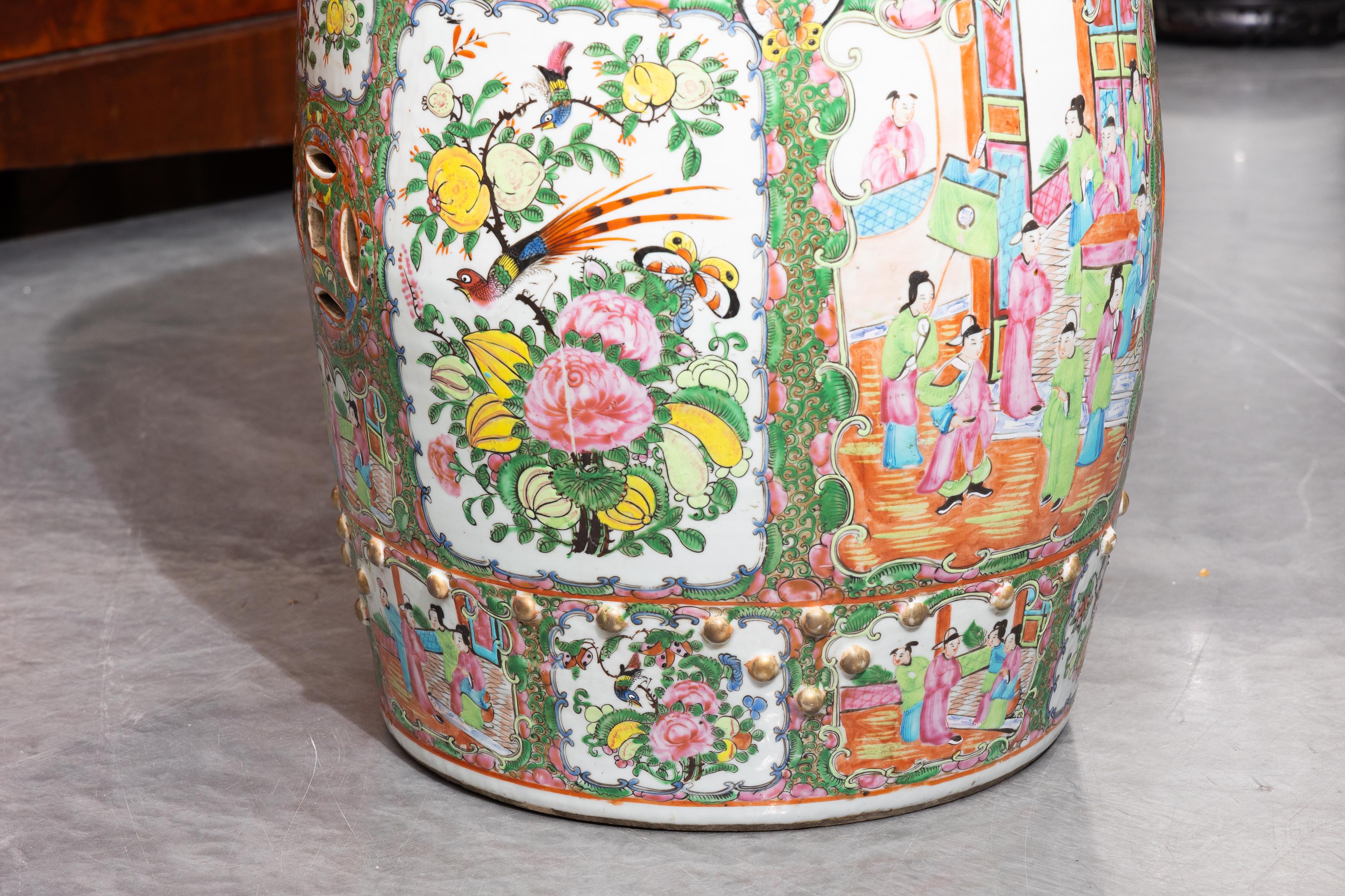 19th Century Chinese Rose Medallion porcelain garden seat, painted with panels depicting interior scenes of birds and flowers.