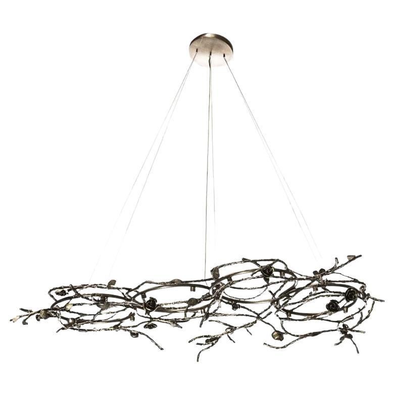 Lampadario ovale rosa