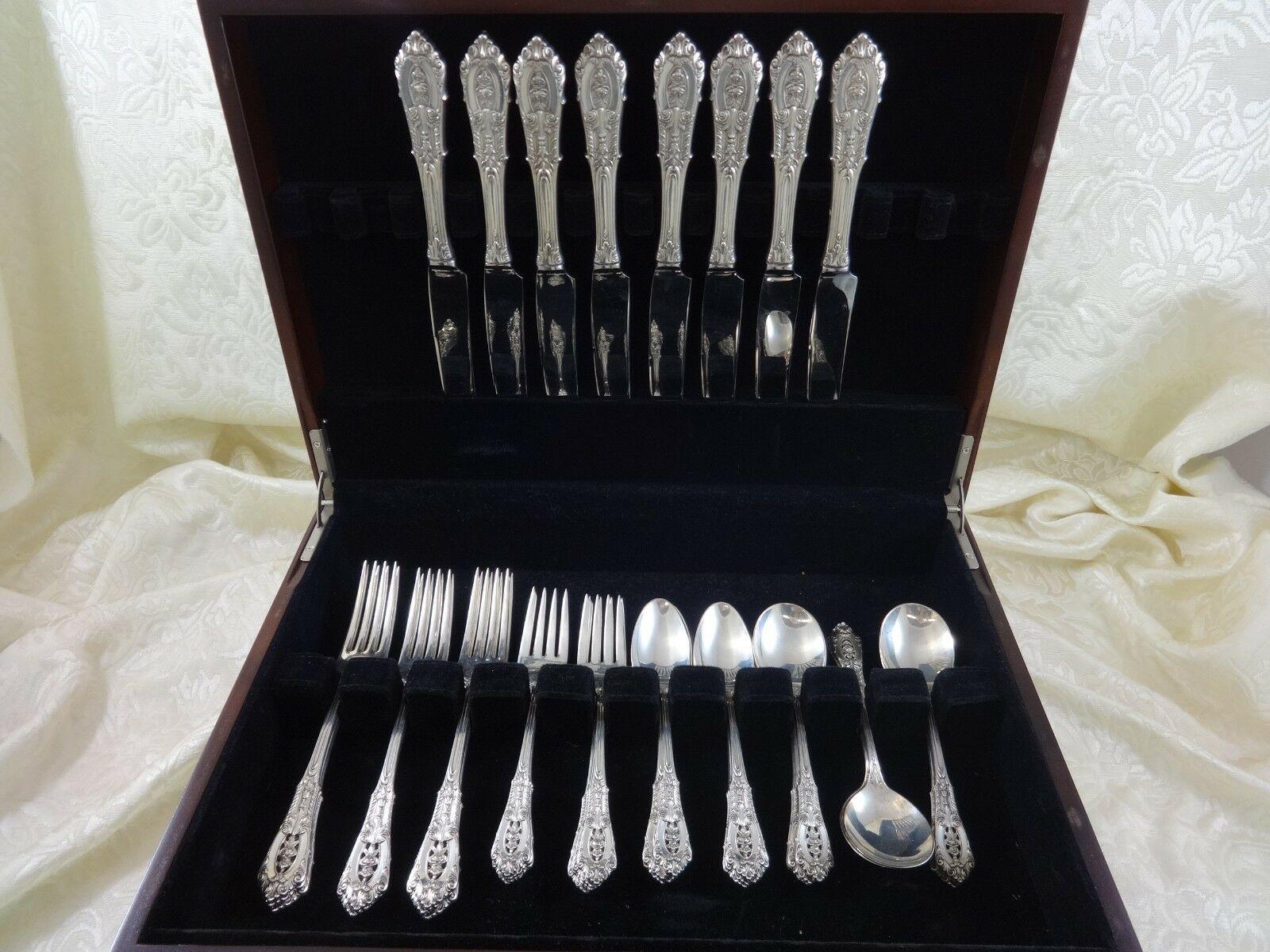 Rose point by Wallace sterling silver dinner size flatware set, 40 pieces. This set includes:

8 dinner size knives, 9 5/8