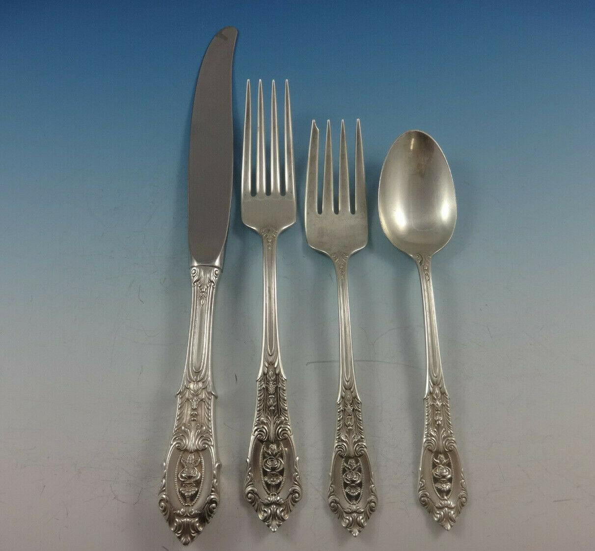 Rose Point by Wallace sterling silver dinner and luncheon flatware set, 71 pieces. This set includes:

8 dinner size knives, 9 3/4