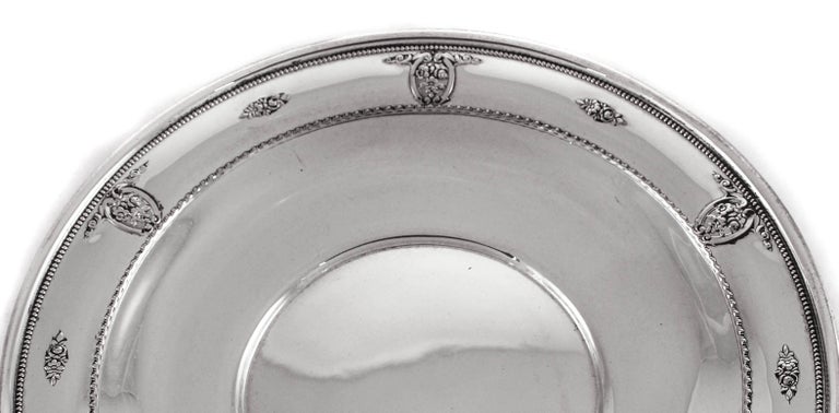 This dainty sterling plate is the ideal size for casual entertaining. It can be used for pastries, finger-food or even sweets. It has a rose motif around the border with cutout work intermittently.