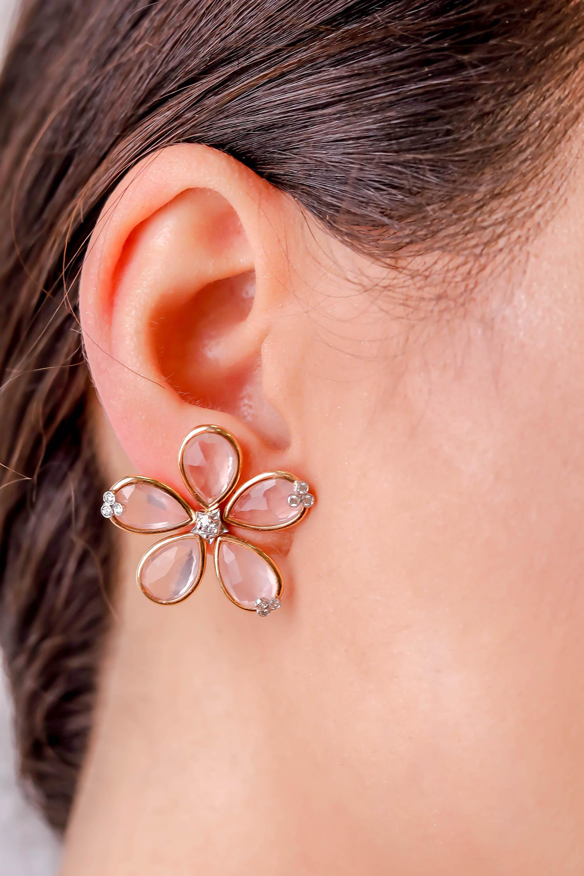 18 Karat Gold Rose Quartz Diamond Gold Daisy Flower Stud Earrings Fine Jewelry

Crafty and elegant pear-shaped rose quartz, creating a delicate daisy flower earring. Accented by brilliant round diamonds of high quality. A great addition to your