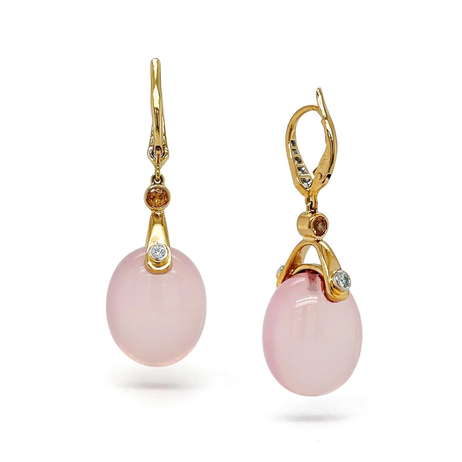 The delicate elegance of rose quartz is highlighted by diamonds and 18k yellow gold for these earrings. 18k yellow gold lever backs are set with brilliant-cut diamonds for a flickering white light, connecting to a single bezel set brilliant-cut