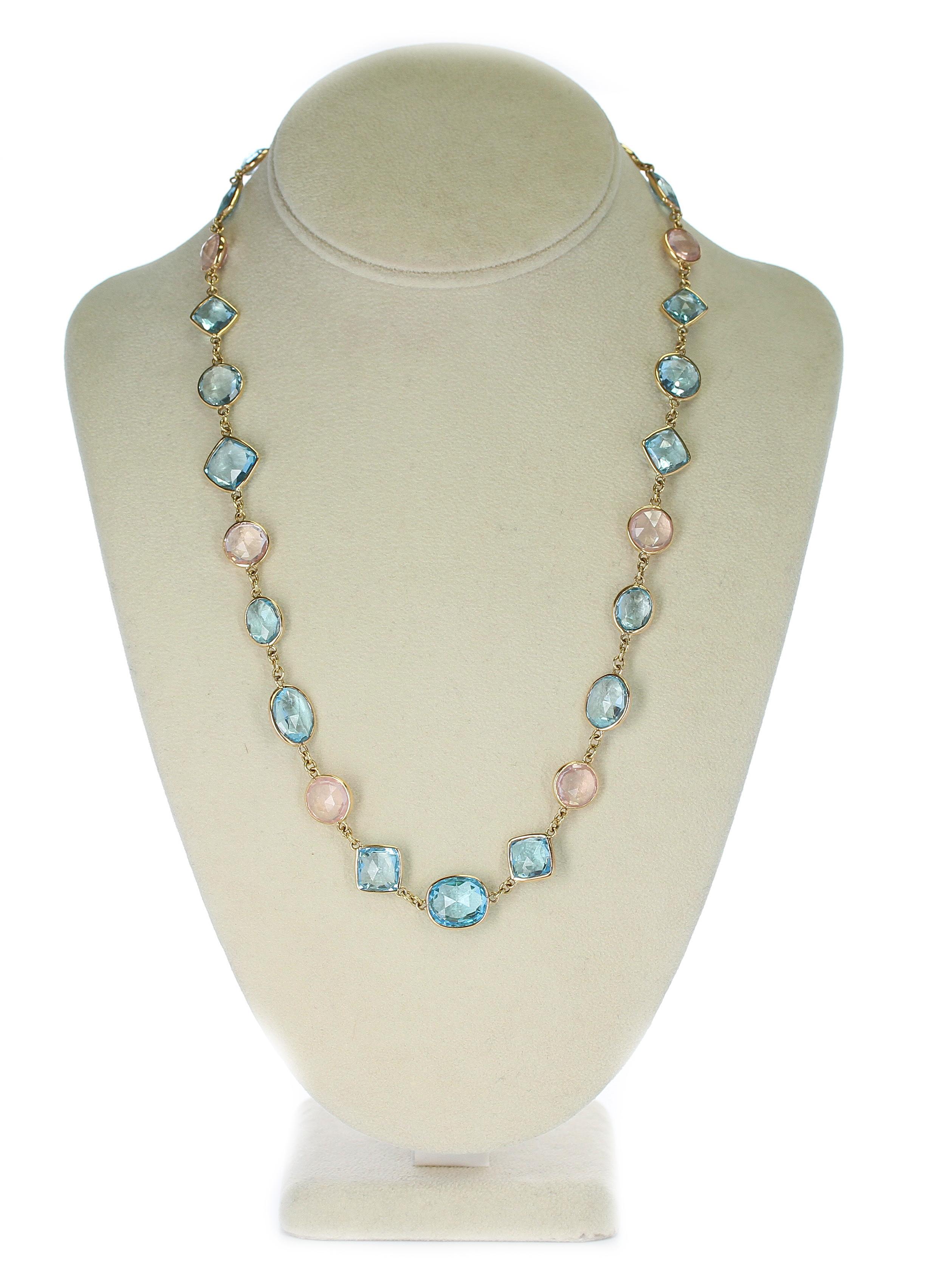 A fine 18K Yellow Gold Necklace with faceted Double Cabochon Rose Cut round-shaped Rose Quartz and Oval & Diamond Shaped Blue Topaz. Length: 21.5 Inches, Weight: 200 carats, 750 Stamped.