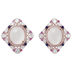 Clous d'oreilles en or 18 carats avec quartz rose et diamants