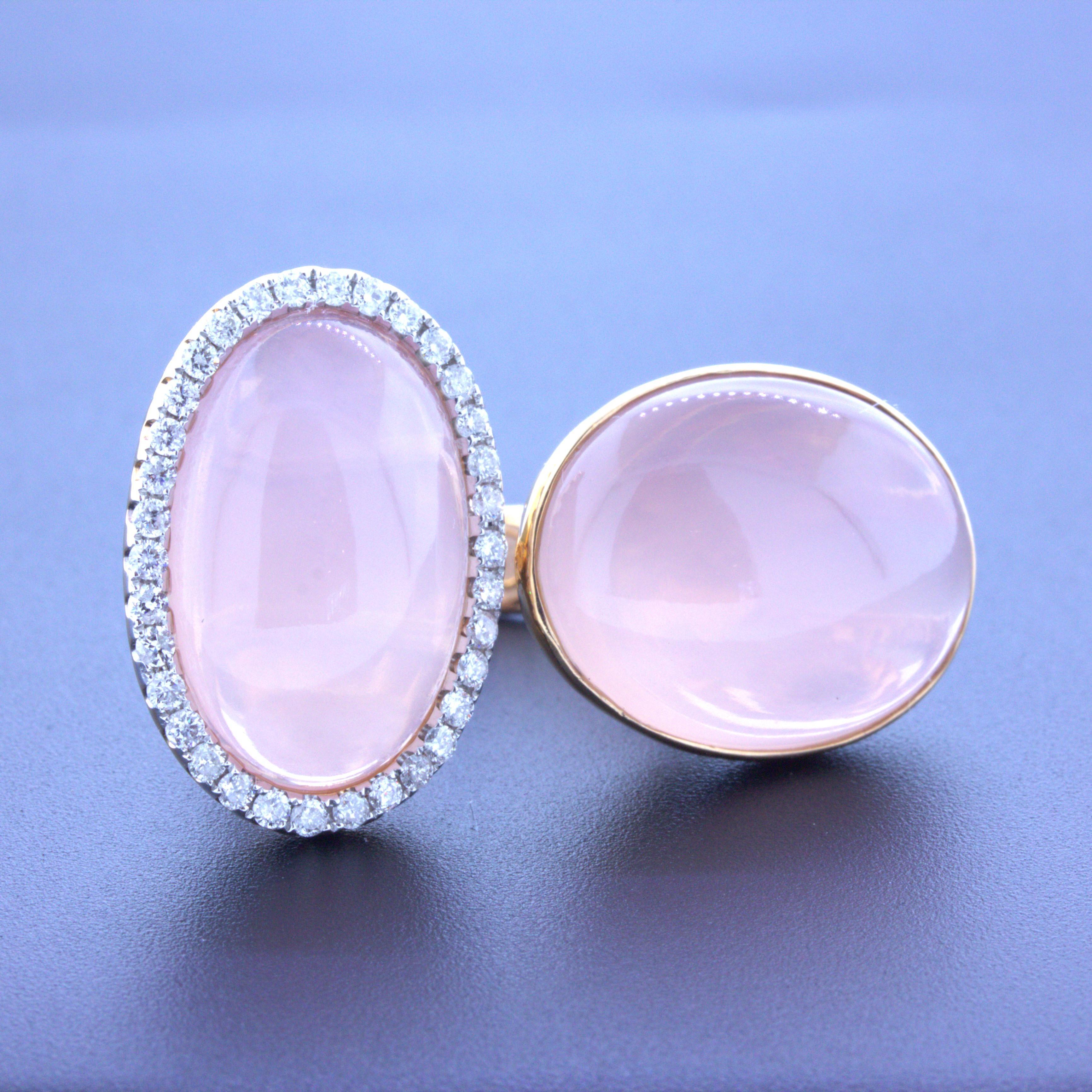 A fun and stylish rose gold ring featuring two cabochon rose quartz with excellent transparency and color. Usually rose quartz is opaque without much light penetrating the stone making them appear dull but these two stones are transparent and glow