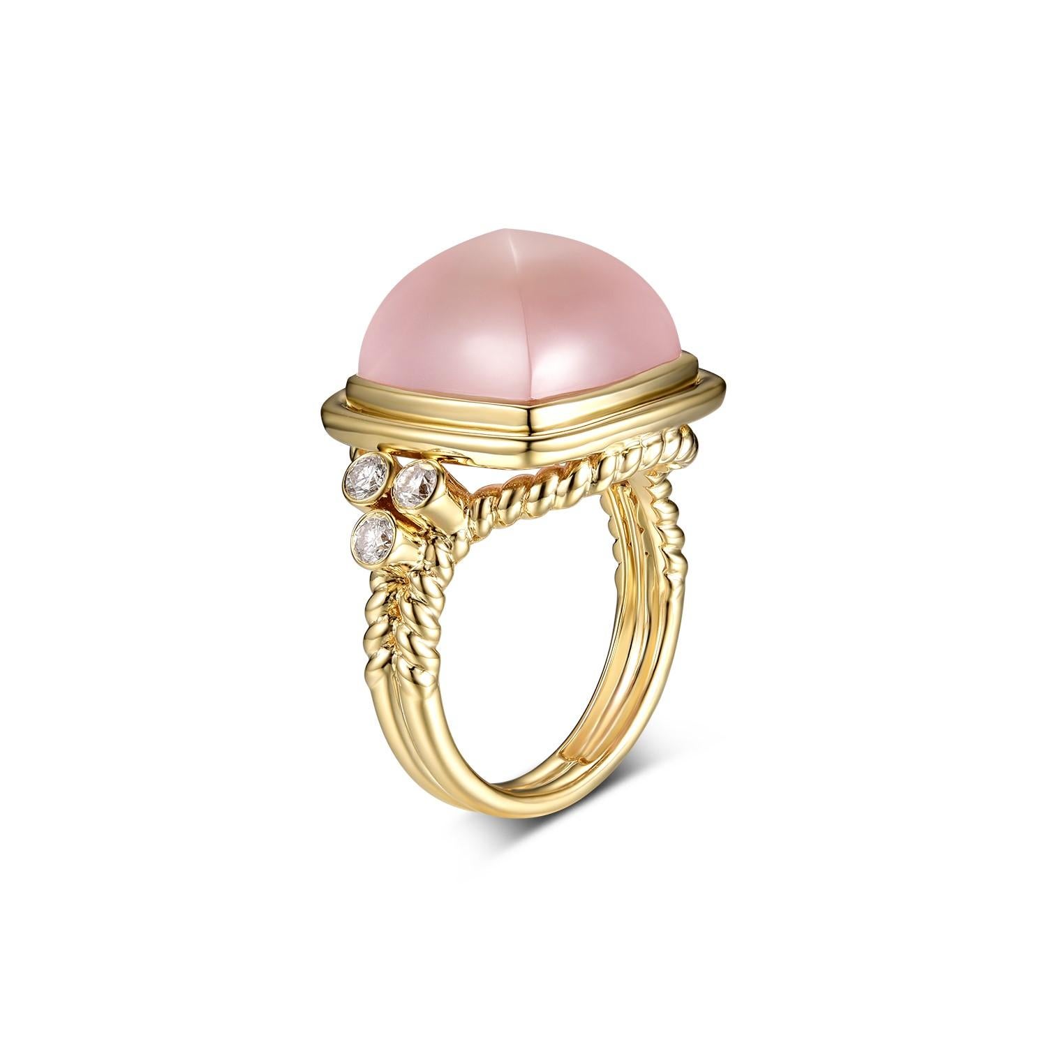 This cocktail ring feature a 9.33 carat sugarloaf rose quartz, assented with 0.26 carat of diamonds on the ring.  Ring is made with 18 karat yellow gold.  Matching earrings are available, please visit our storefront or send a private message to