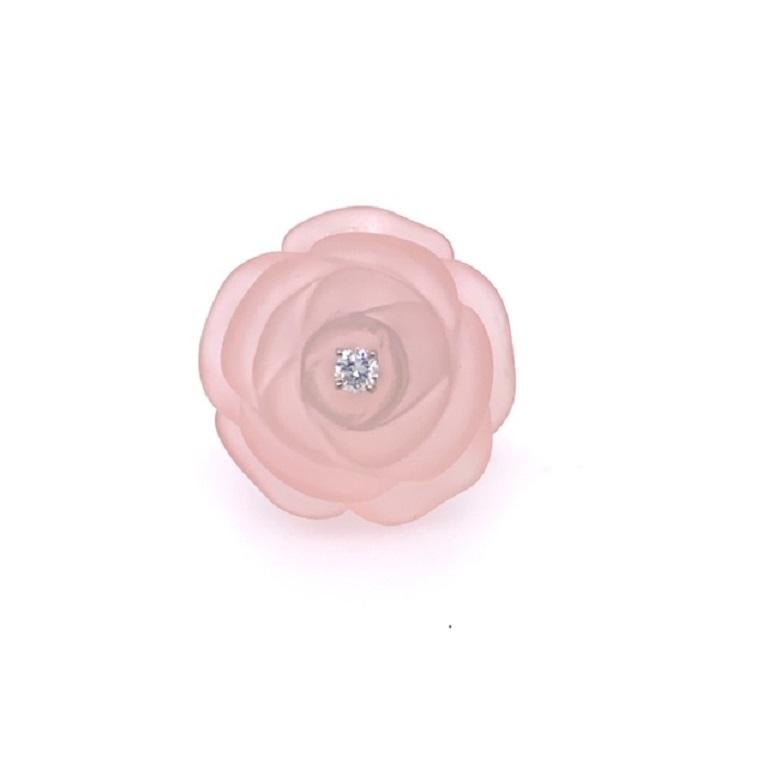 This beautiful ring is comprised of carved Rose Quartz weighing 39.91 carats, mounted with collection white diamonds totaling .66 carats. It is expertly carved to resemble a stunningly delicate rose. Hand-crafted in 18 karat white gold.

Complete