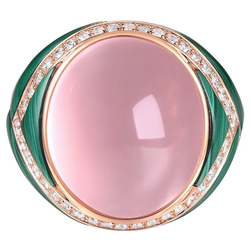 Elevate your jewelry collection with this exquisite cocktail ring, featuring a striking 19.51 carat rose quartz gemstone set in a stunning 14 karat rose gold mounting. The rose quartz is the star of the show, held securely in place with a bezel