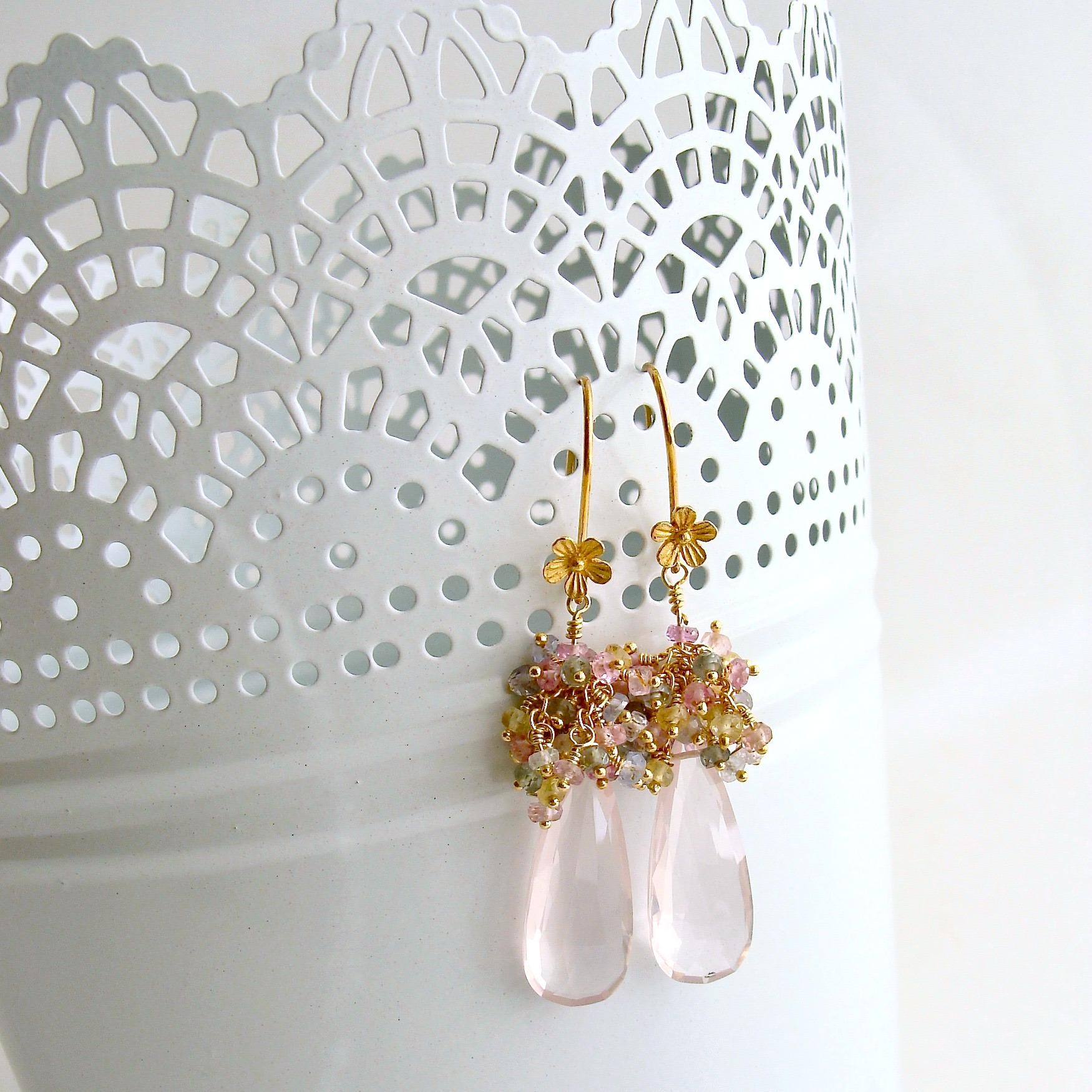 Softly colored rose quartz faceted elongated teardrops have been topped with a cascade of delicate pastel sapphire tendrils creating a pair of romantic fairy tale earrings.  The gold vermeil earrings have been paired with an ear wire featuring a