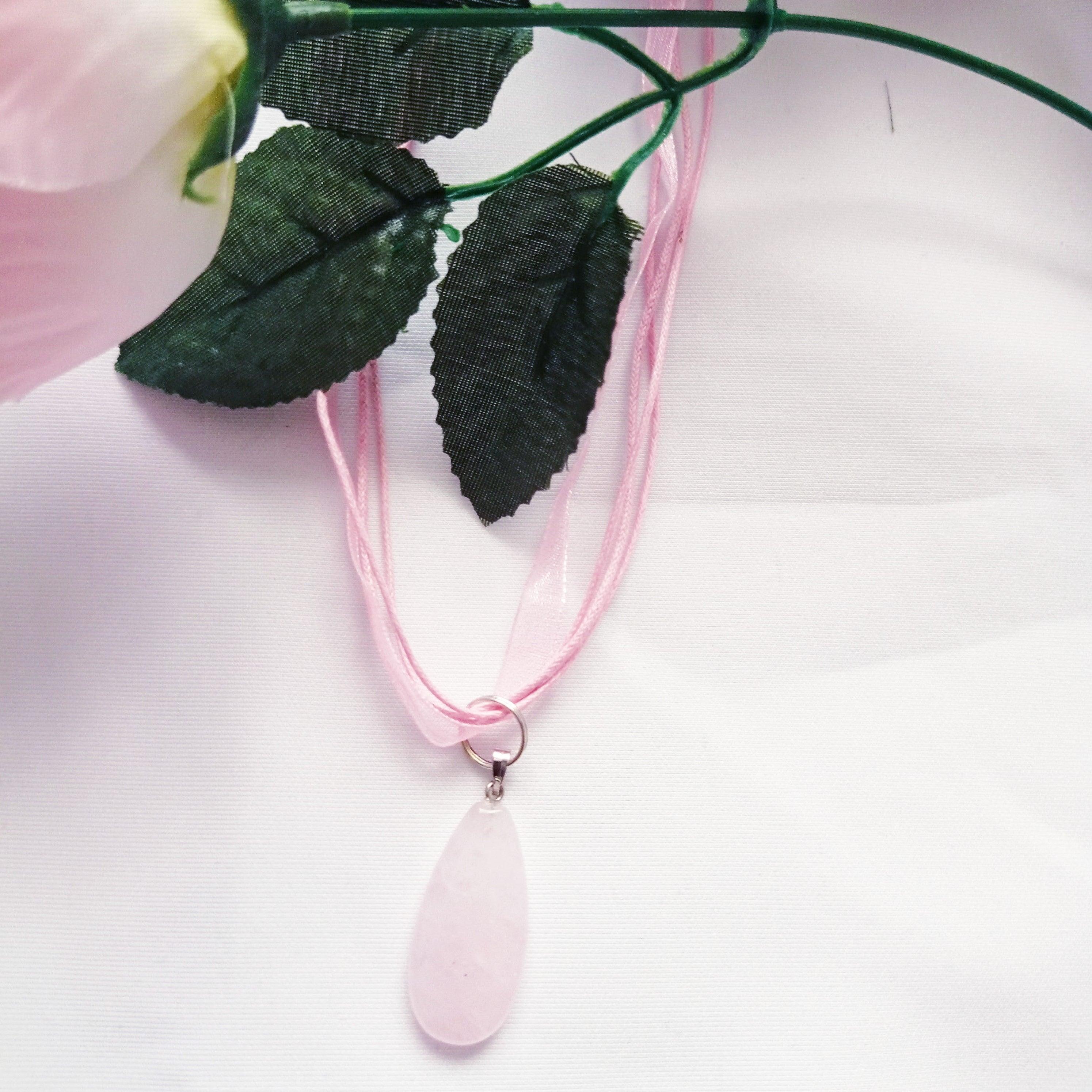 The pink of the organza and Rose Quartz are a such wonderful complement it makes this necklace fun and simple. Made with Rose Quartz gemstones and finished with an Organza Ribbon & Cord chain, this necklace is perfect for anyone who loves natural