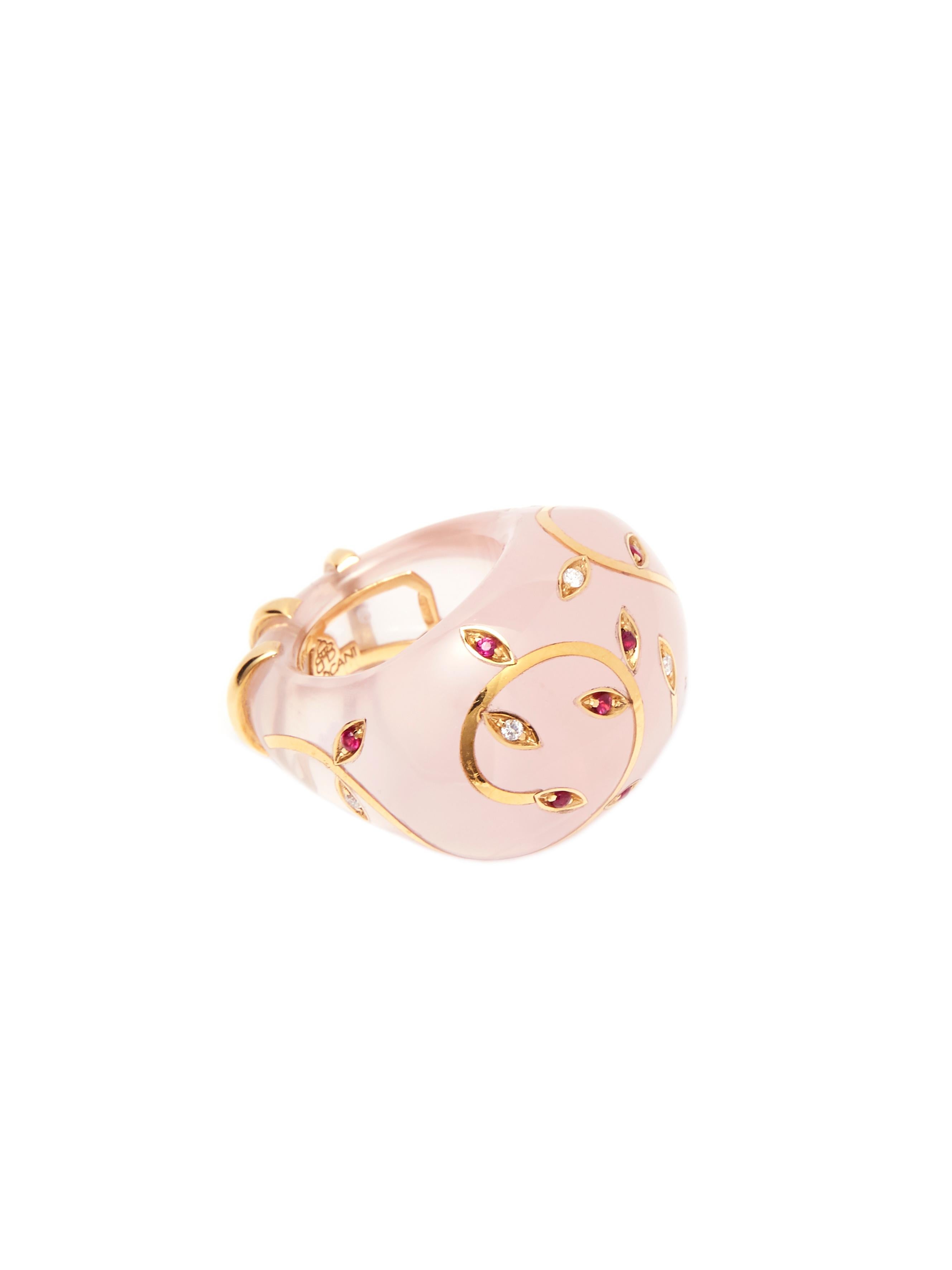 Ring sculpted in top quality rose quartz with floral decoration executed with high carat yellow gold inlay and set with faceted rubies and diamonds.

Admire the beauty and craftsmanship of this ring, a piece that is truly unique; you will not find