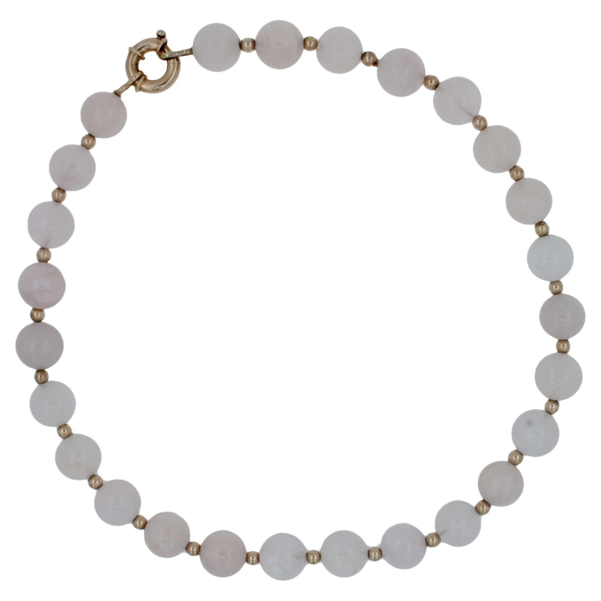 Rose Quartz Round Circle Sphere Beads 14 Karat Yellow Gold Bead Short Necklace
14 Karat Yellow Gold Beads + Solid Gold Clasp 
16.5 Inches Length 
Genuine Rose Quartz Round Circle Spheres
The gemstone beads are misty rose pink with a beautiful