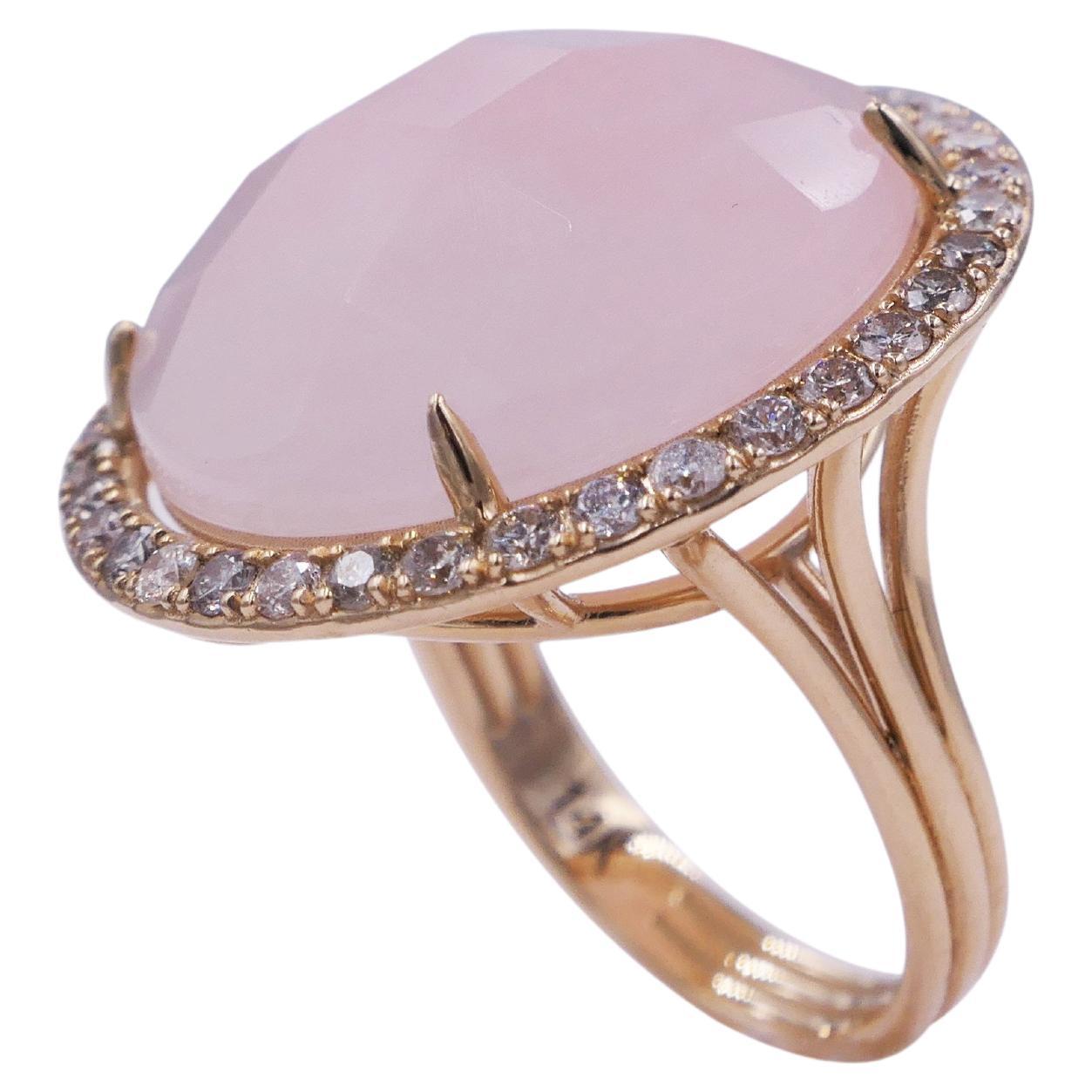 Rose Quartz Round Faceted Cabochon Diamond Halo Pave 14 Karat Yellow Gold Ring
14 Karat Yellow Gold
Rose Quartz Cabochon Gemstones
0.60 cts Diamonds
Size 7, Resizable upon request 

Important Information:
Please note that this item will take 2-4