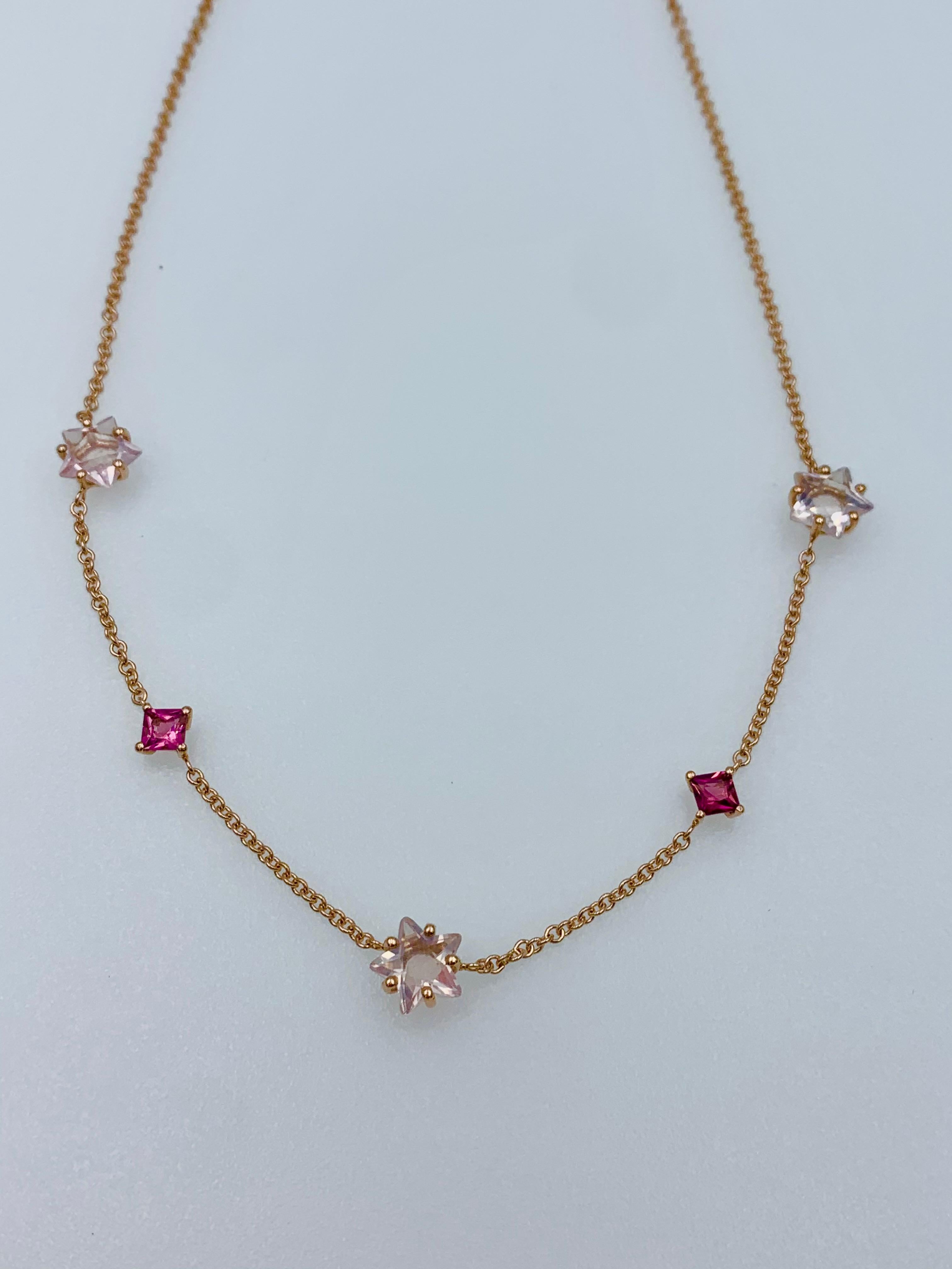 Hand made 9 karat gold five stone chain choker necklace with three Rose Quartz Stars and two diamond shaped pink Tourmalines. This 16