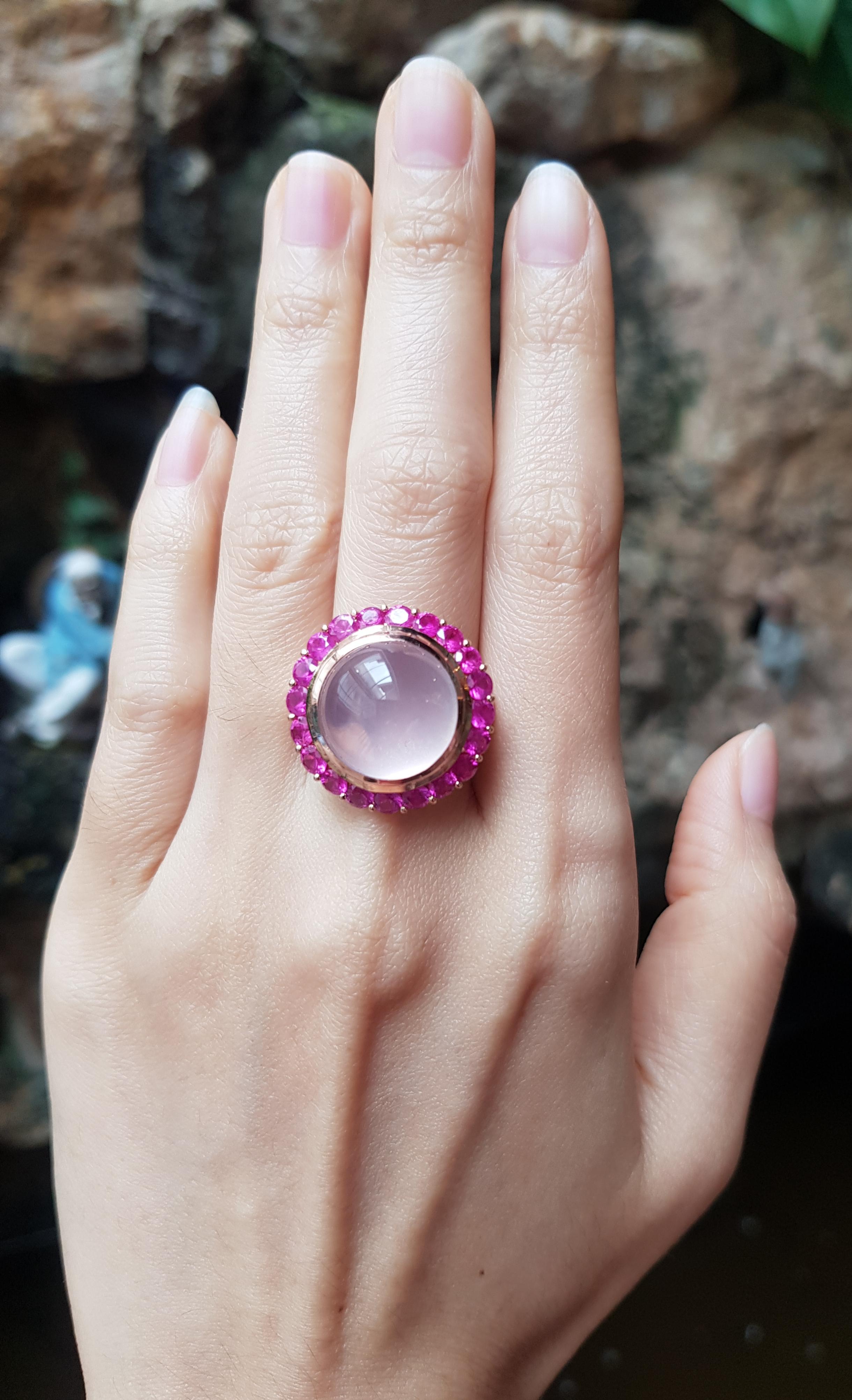 Rose Quartz 14.73 carats with Pink Sapphire 2.97 carats Ring set in 18 Karat Rose Gold Settings

Width:  2.1 cm 
Length: 2.1 cm
Ring Size: 53
Total Weight: 15.86 grams

