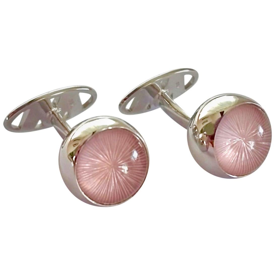 Elegant classical cufflinks designed by Clemens Ritter von Wagner are made of 750/0 white gold.
The rose quartz spheres with 
