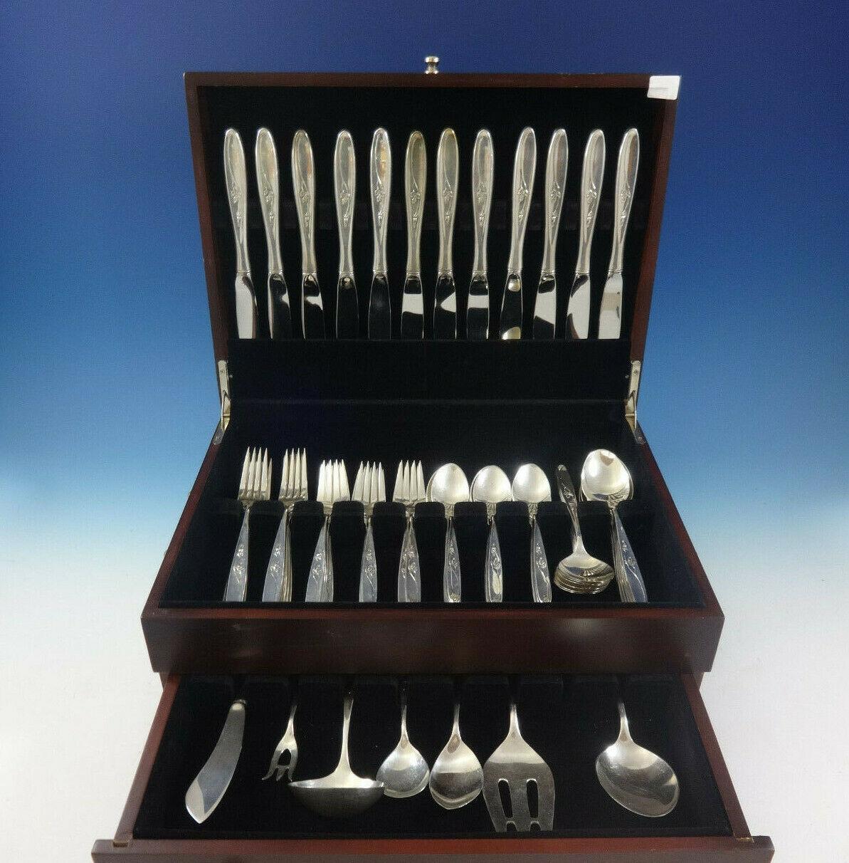 Beautiful Rose Solitaire by Towle sterling silver flatware set of 67 pieces. This set includes:

12 knives, 9