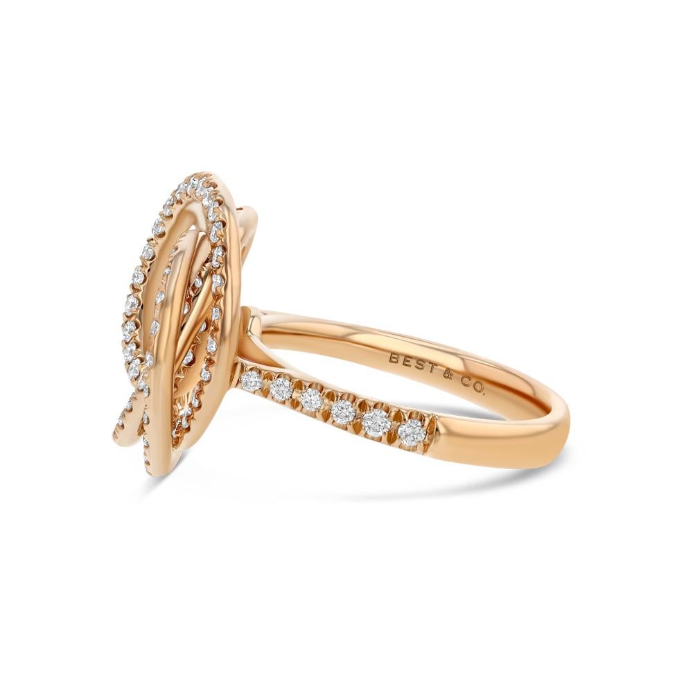 Our Rose Swirl Ring is a truly dazzling piece. With an 18 karat rose gold band swirling up into spiraling rows of diamonds, an abstract rose is brought to life right atop your very finger.

(18k rose gold and 109 white diamonds)
