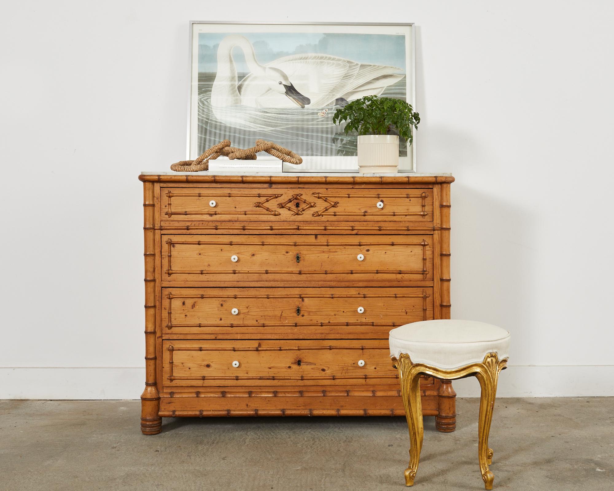 Opulent carved French provincial style round footstool by Rose Tarlow Melrose House Los Angeles, CA. The petite stool is supported by elegant cabriole legs ending with scrolled feet. The carved wood has an intentionally aged gilt finish to mimic