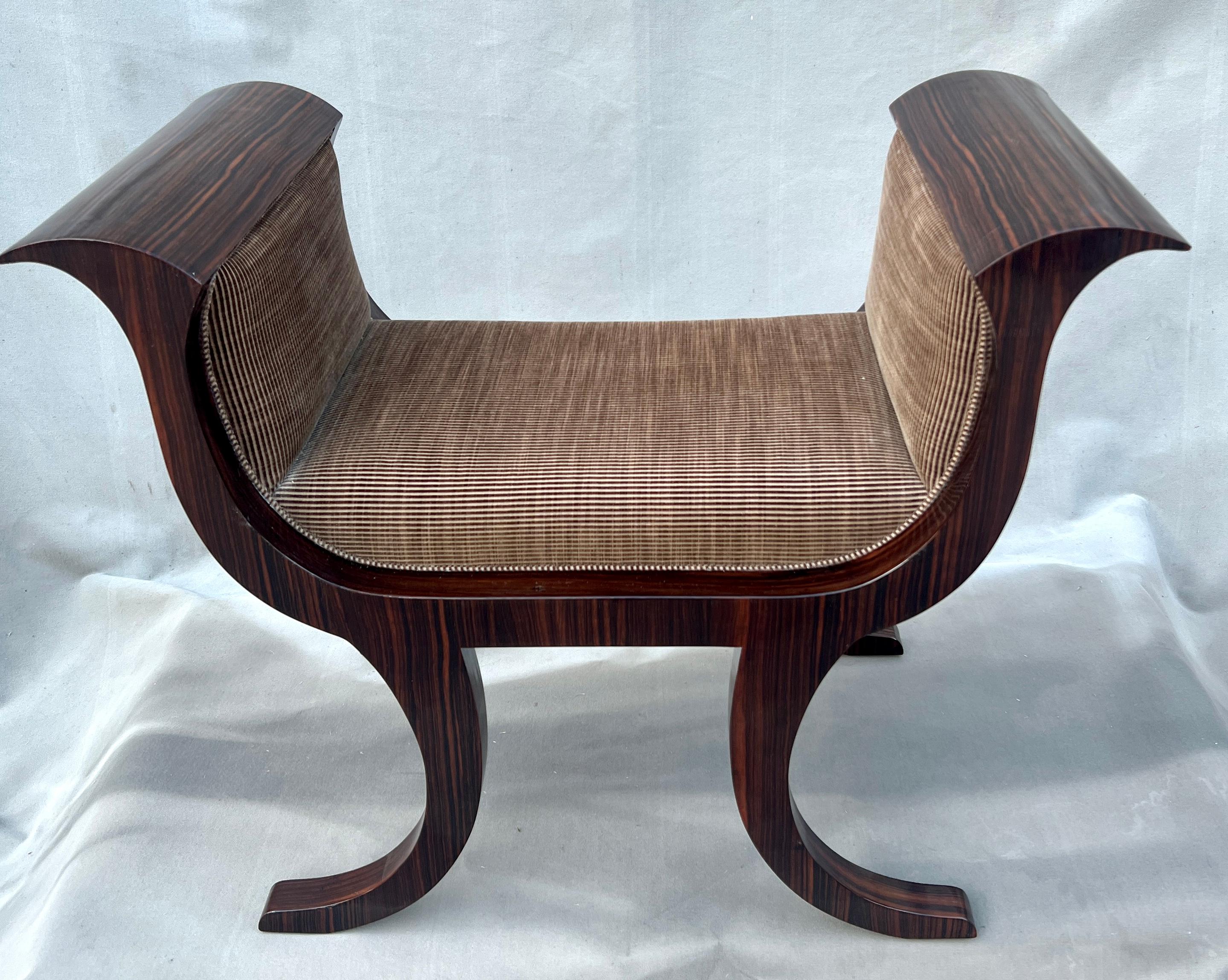 An Impeccable Bench by Rose Tarlow Melrose House in the Regency Style

The Macassar Ebony Veneer is stunning, with an architectural design to match.  The piece is a wonderful statement that is both impressive and comfortable for an afternoon