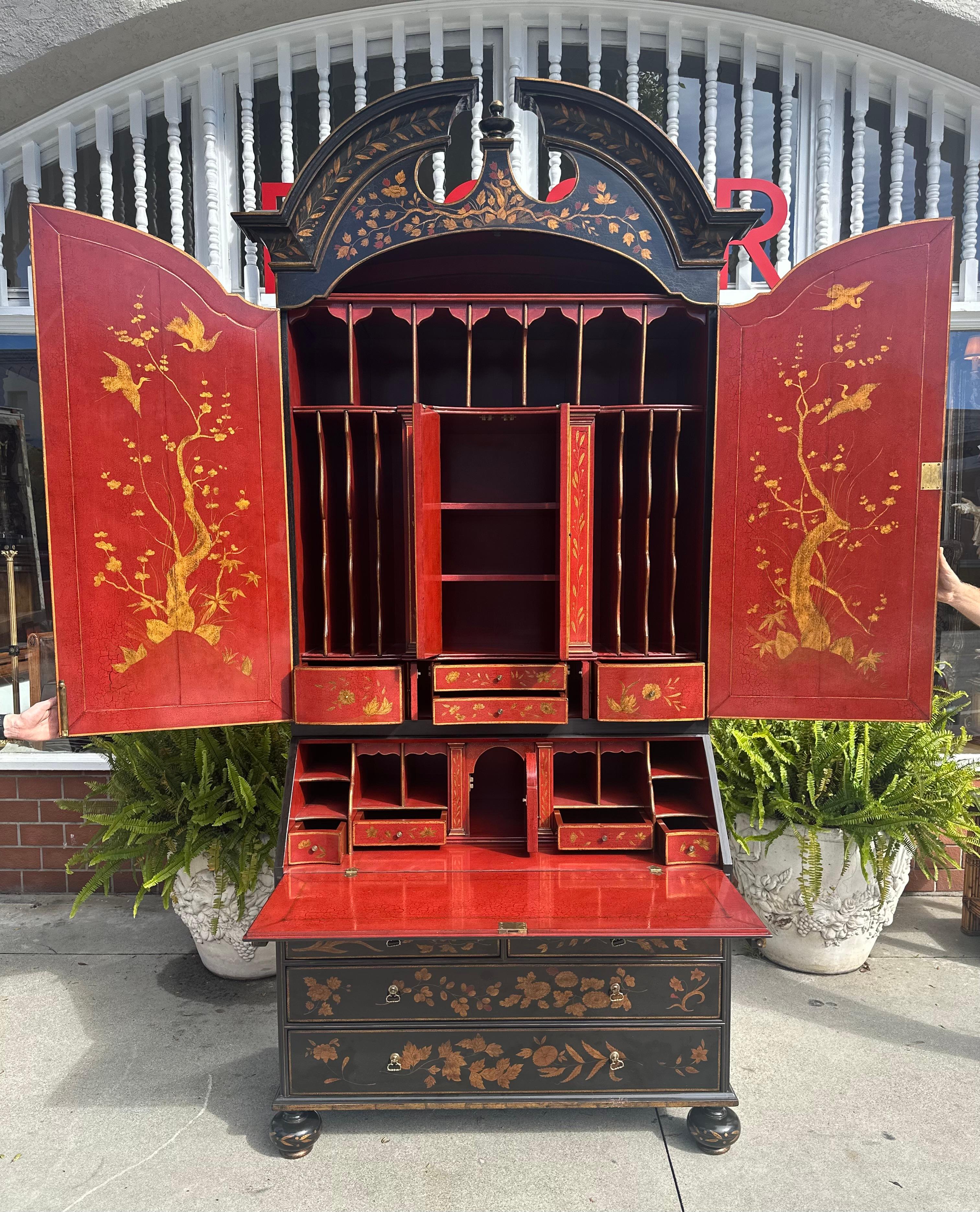 Rose Tarlow Melrose House Queen Anne Black & Red Chinoiserie Secretary Desk. It features the most wonderful hand painted, black and gold chinoiserie painted exterior with an equally amazing red and gold chinoiserie interior. It was made by Rose