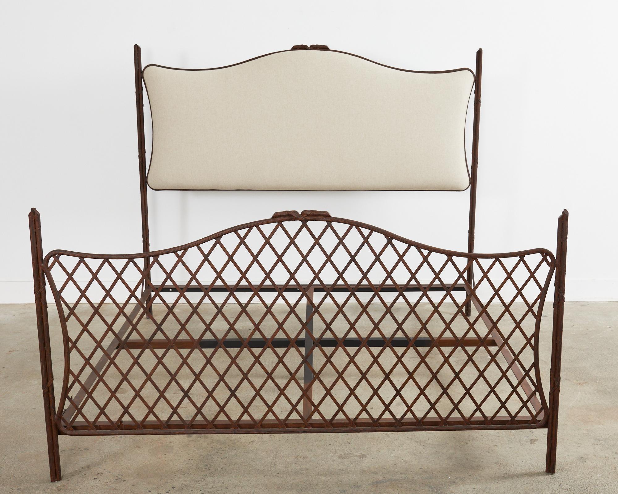 Remarkable iron faux bois twig king size headboard, frame, and footboard made in the neoclassical taste of Rose Tarlow iron patio and garden furniture. The grand bed features a frame crafted from bundled iron twig rods or branches lashed together