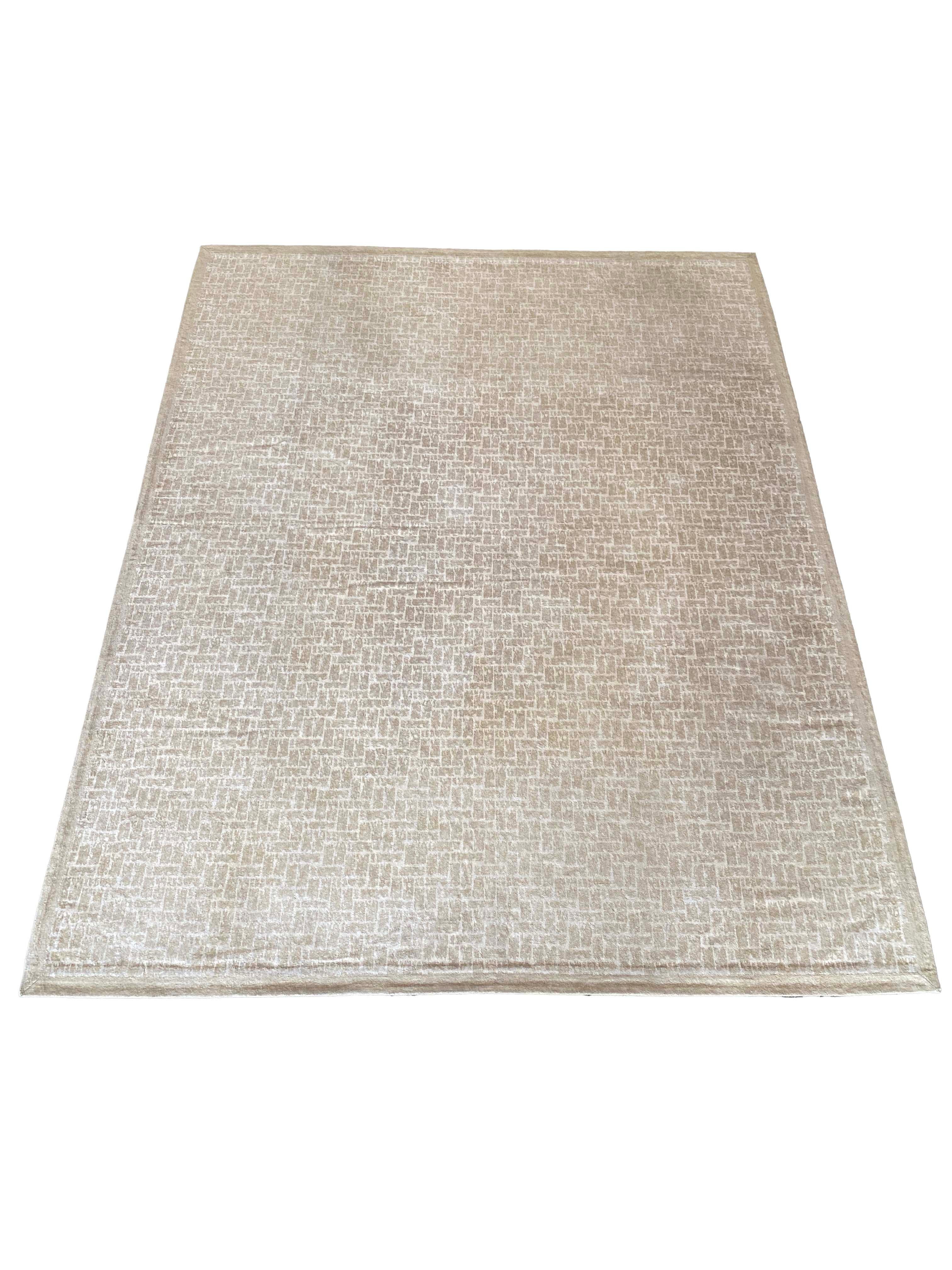 Una exquisita alfombra Rose Tarlow, una pieza atemporal que destila elegancia y sofisticación. Elaborada con meticulosa atención al detalle, la alfombra presenta un fascinante dibujo de espiga y tejido de cesta en suaves tonos tostados, beige y