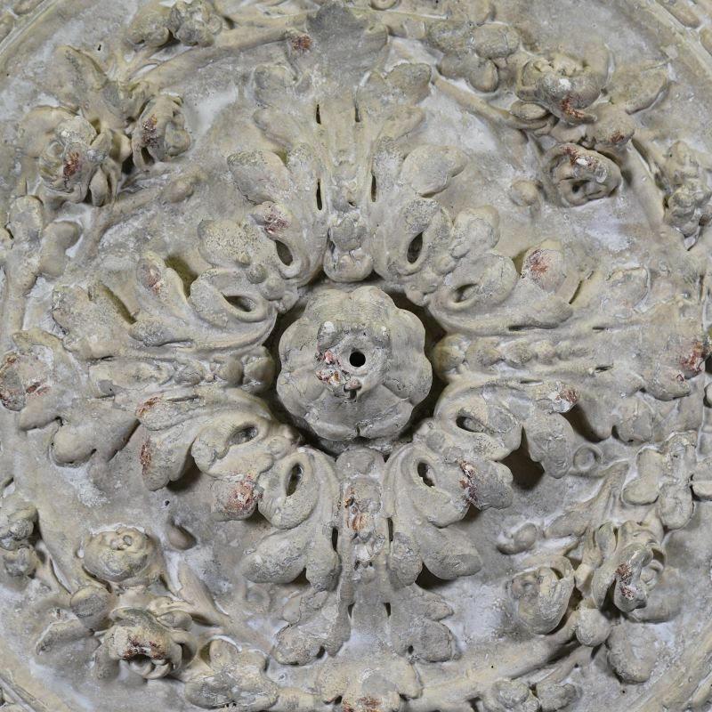 Rose window for a Haussmann-style flat ceiling light, patinated plaster and resin cast mounted on a metal base.

A magnificent re-edition of a 19th-century rose window, found one fine afternoon at the Saint Ouen flea market! This rose window most