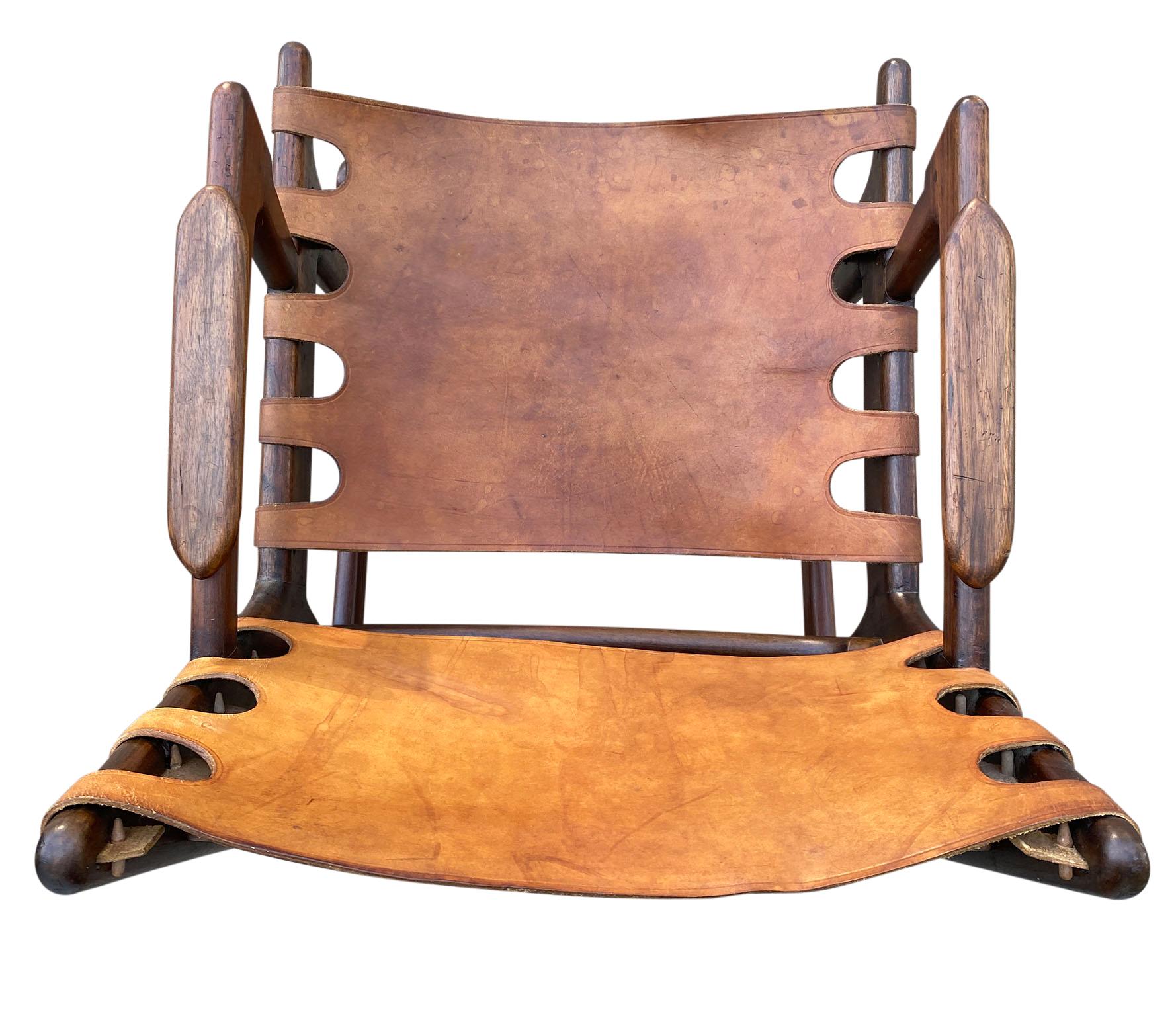 Rose wood and leather sling rocking chair by Ecuadorian designer Angel Pazmino 1